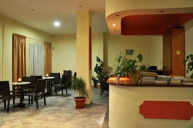 Communal lounge/ TV room in Hotel Pyrros