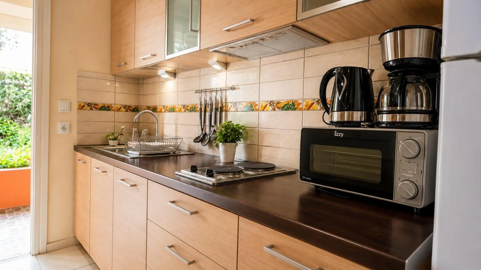 Kitchen or kitchenette in Kaloudis Studios & Apartments