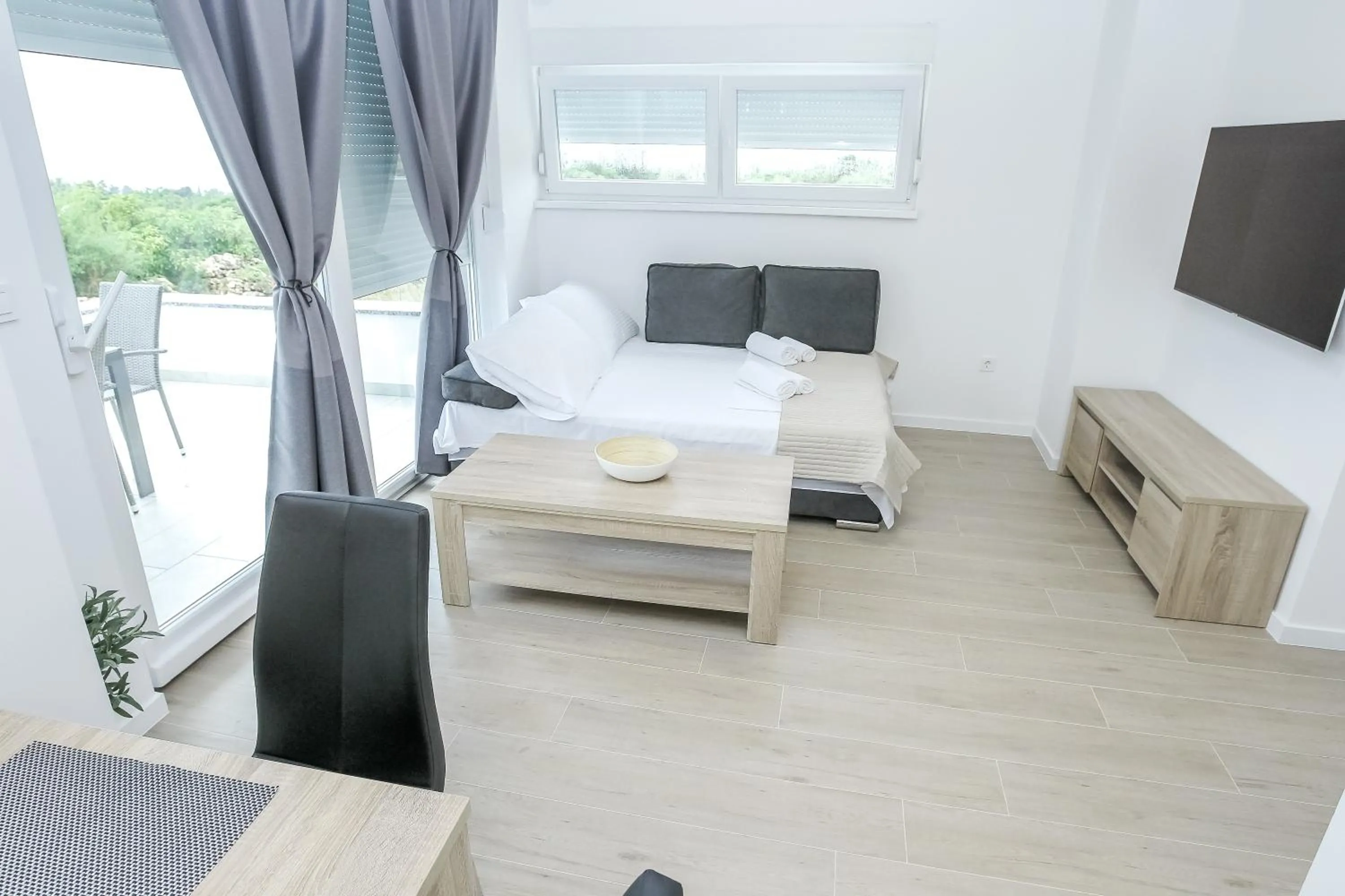 Living room, Bed in Pool Apartments Villa Dalia