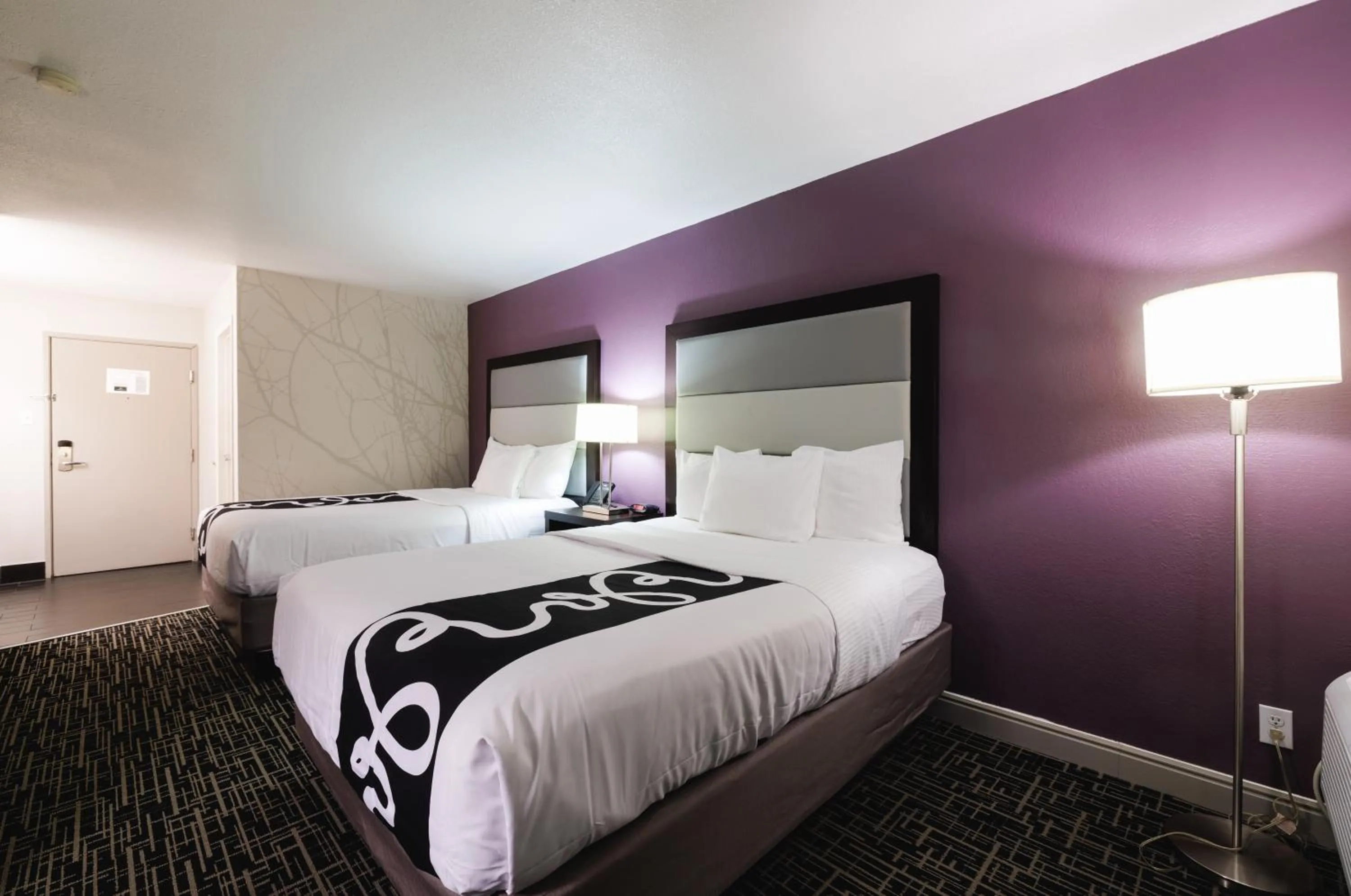 Bed in La Quinta Inn & Suites by Wyndham Fort Collins, Colorado