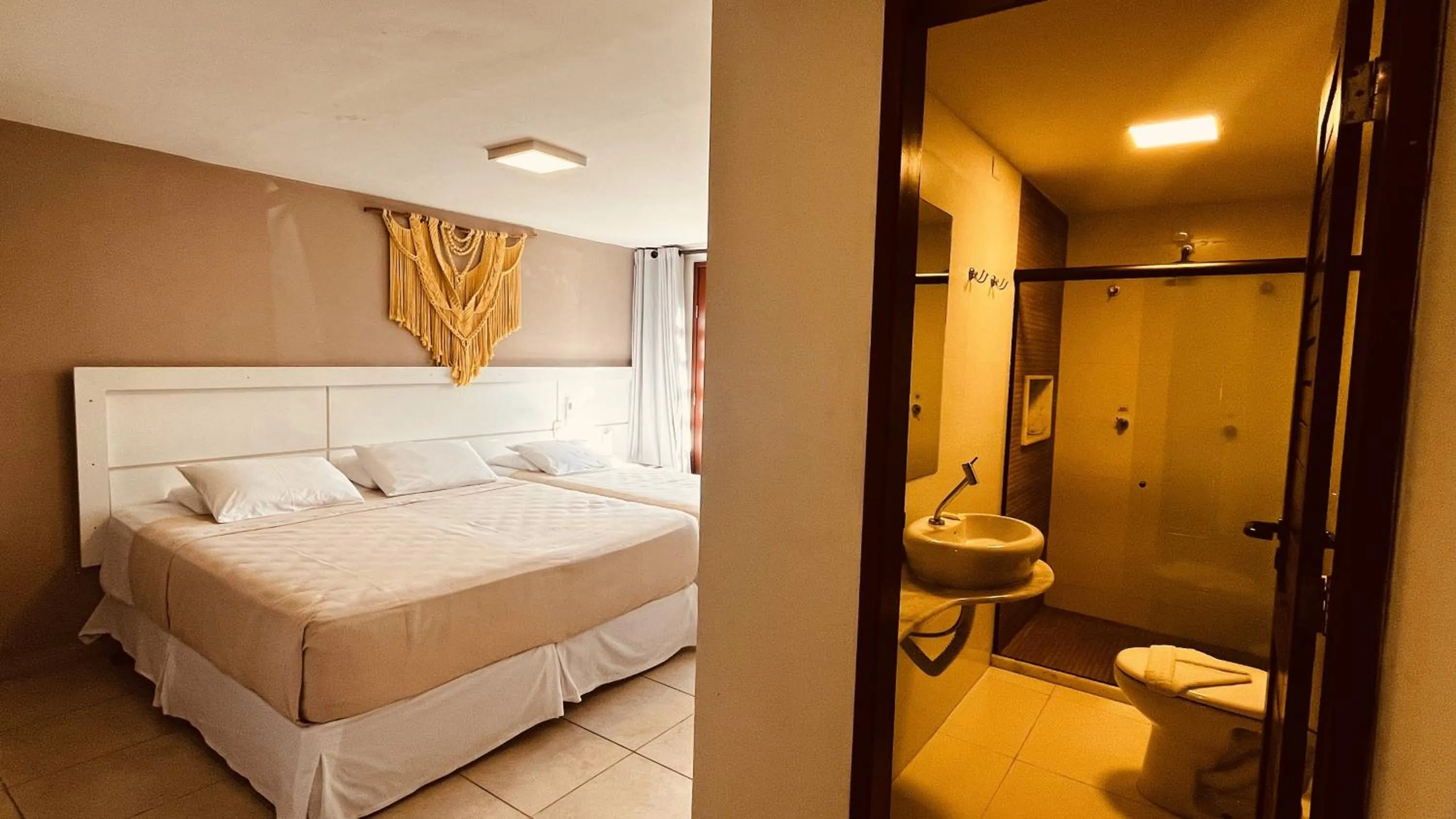 Photo of the whole room, Bed in Pousada Iandê