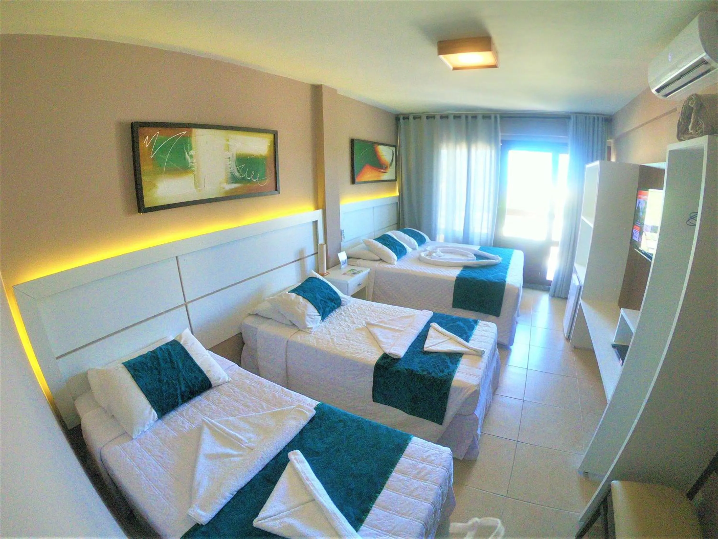 Bed in Pousada Iandê