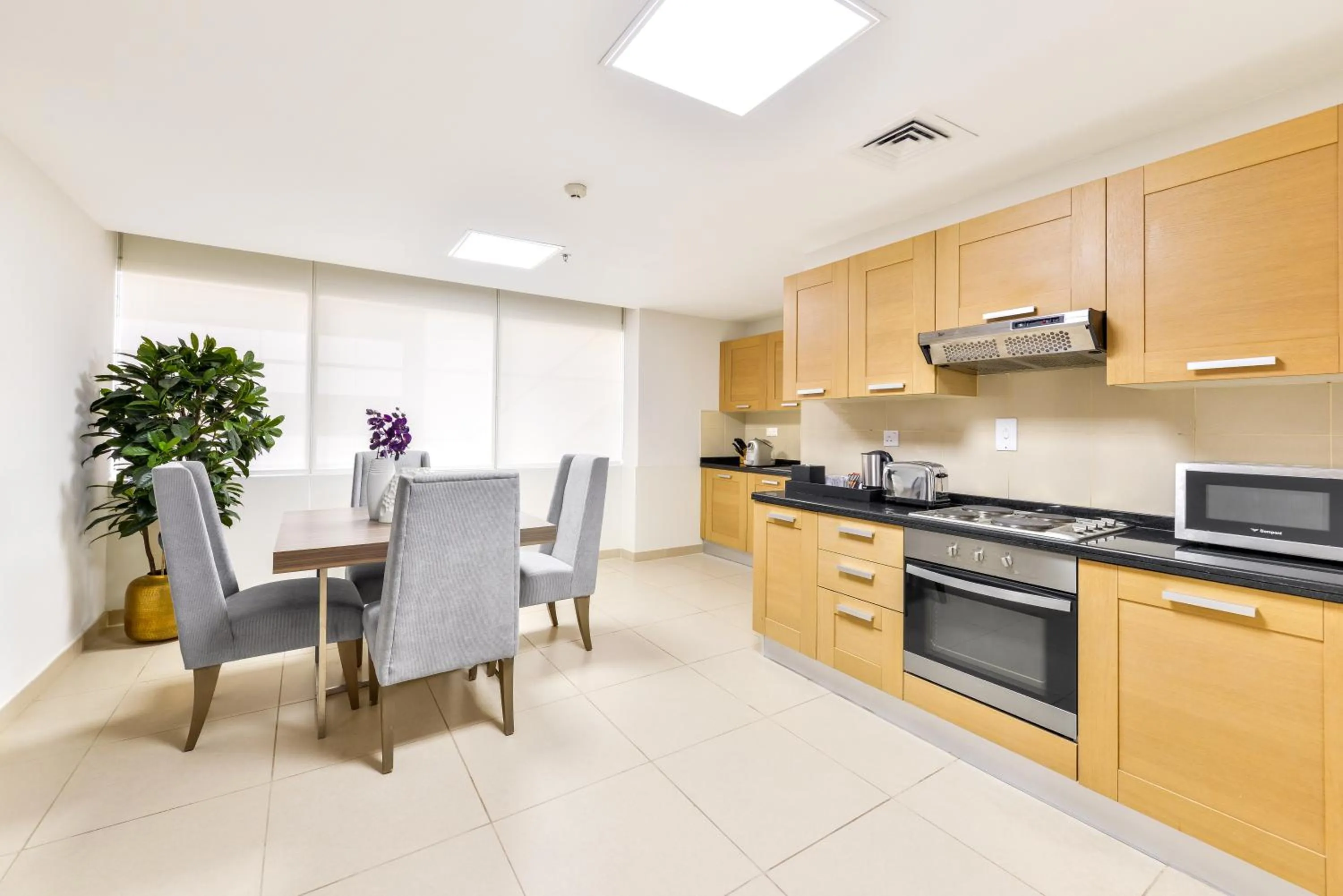 Kitchen or kitchenette in Nassima Tower Hotel Apartments