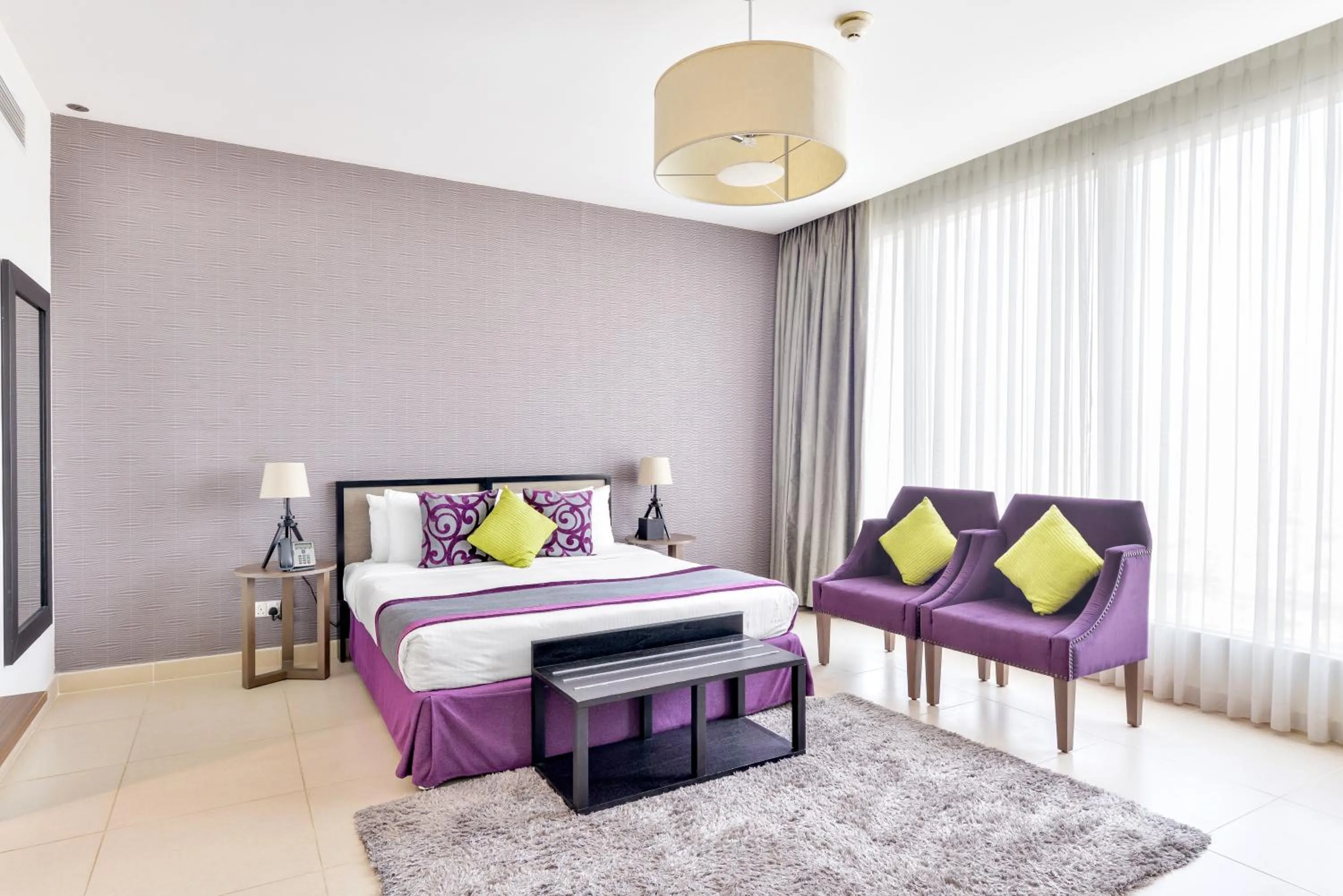 Bed in Nassima Tower Hotel Apartments