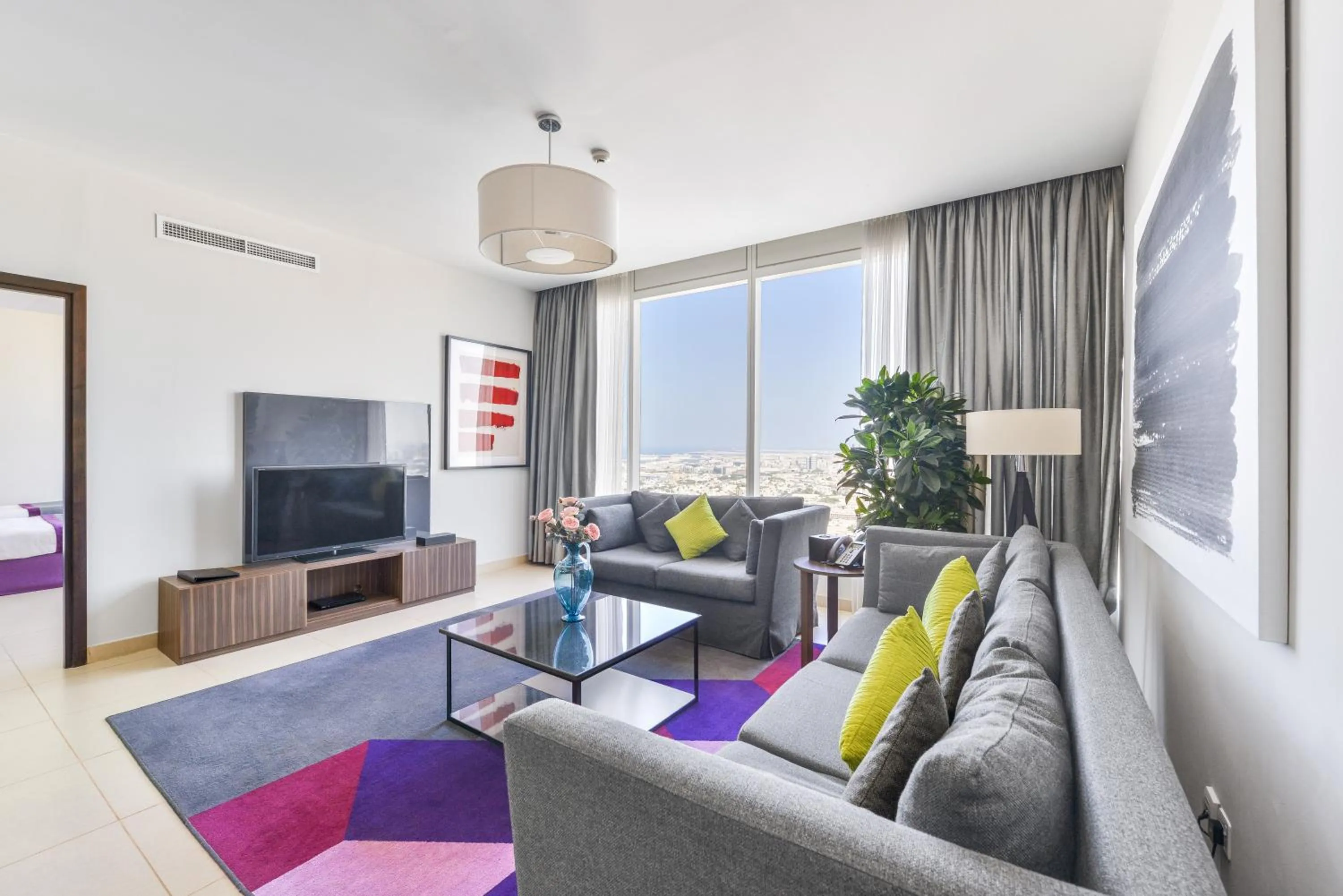 Living room in Nassima Tower Hotel Apartments