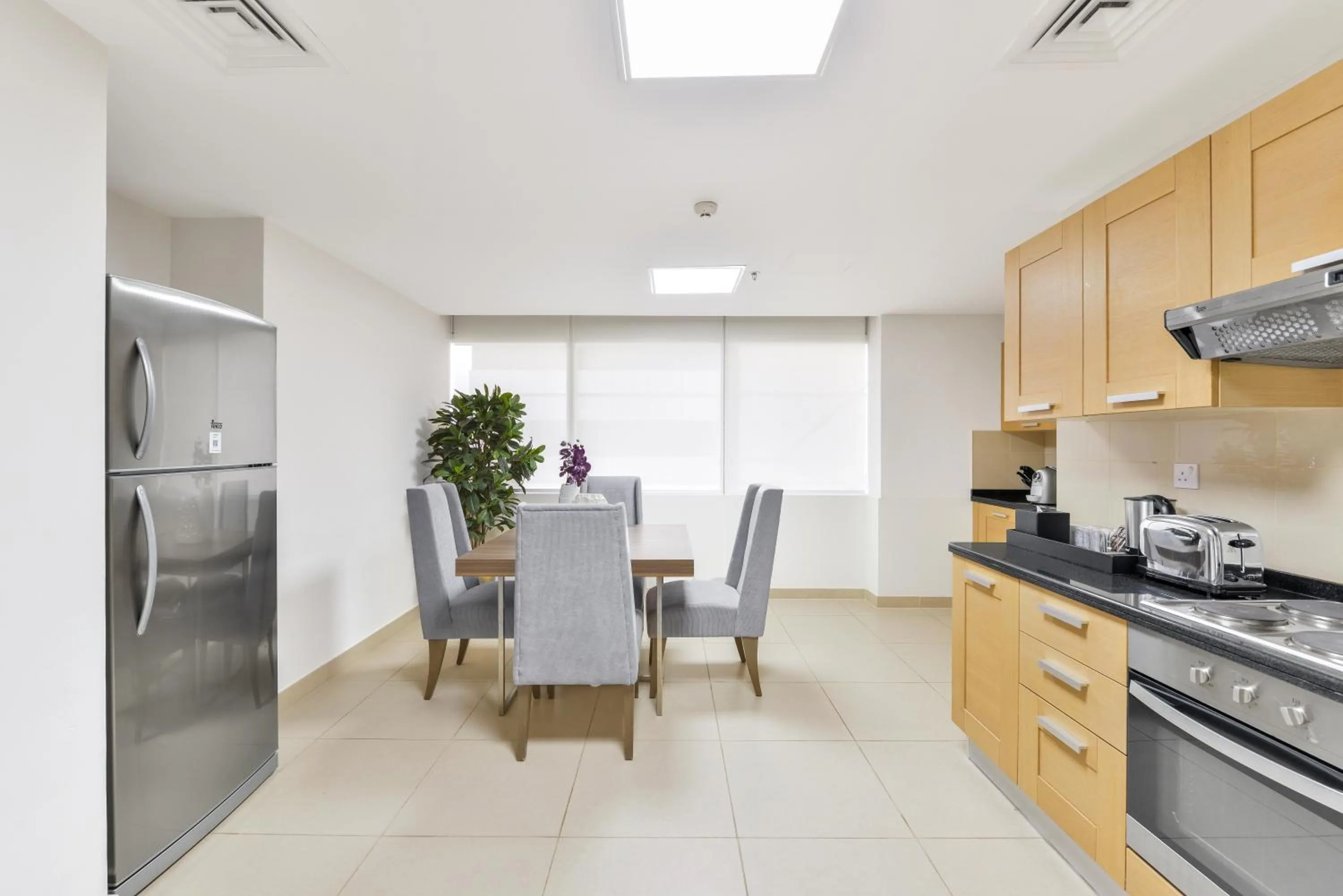 Kitchen or kitchenette in Nassima Tower Hotel Apartments