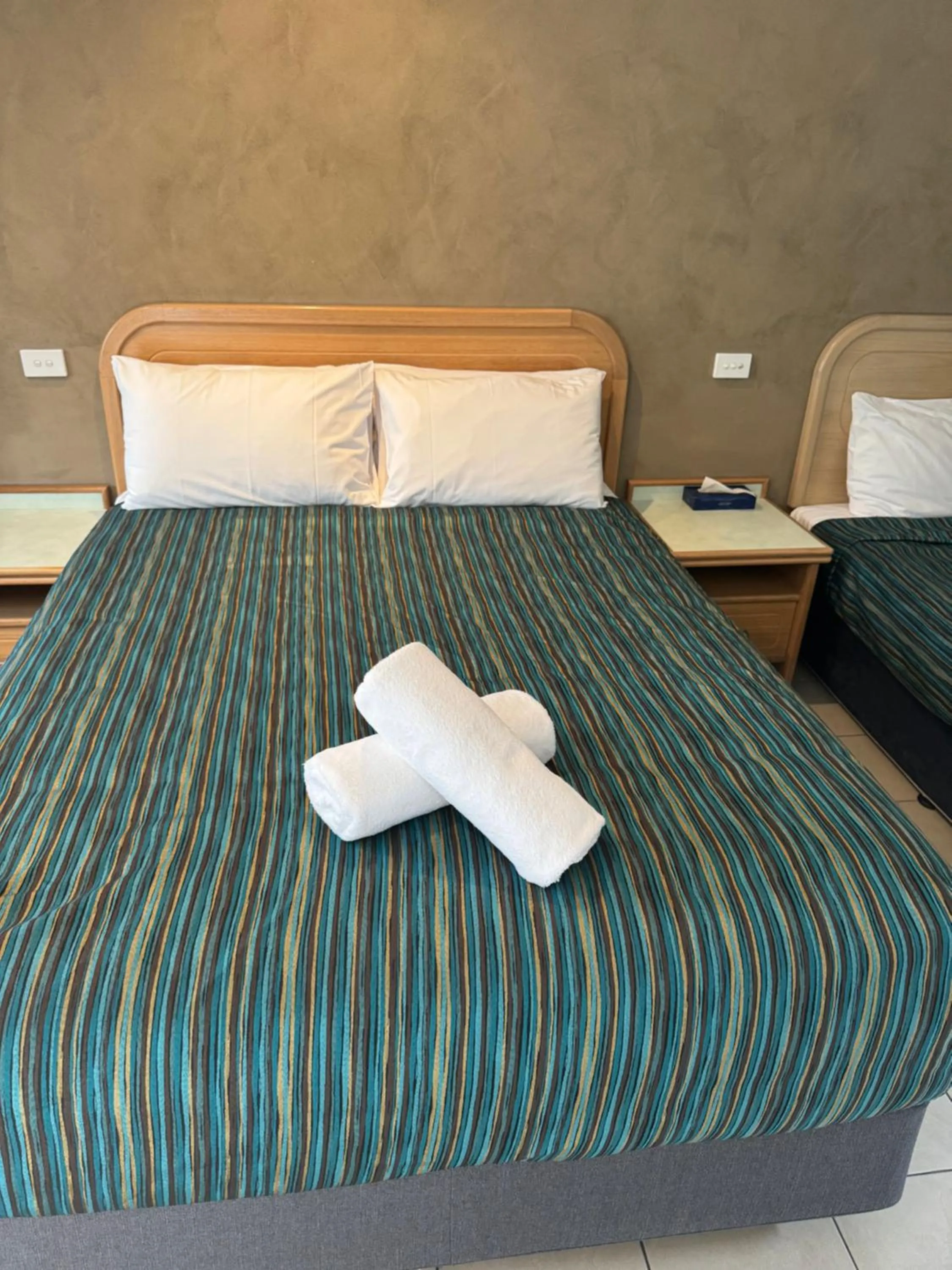 Bed in Chelsea Motor Inn