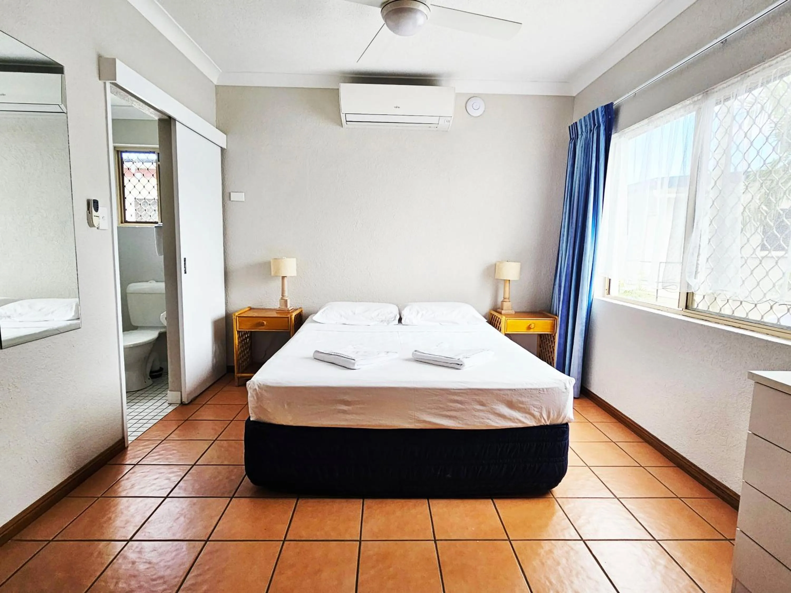 Bed in Royal Palm Villas