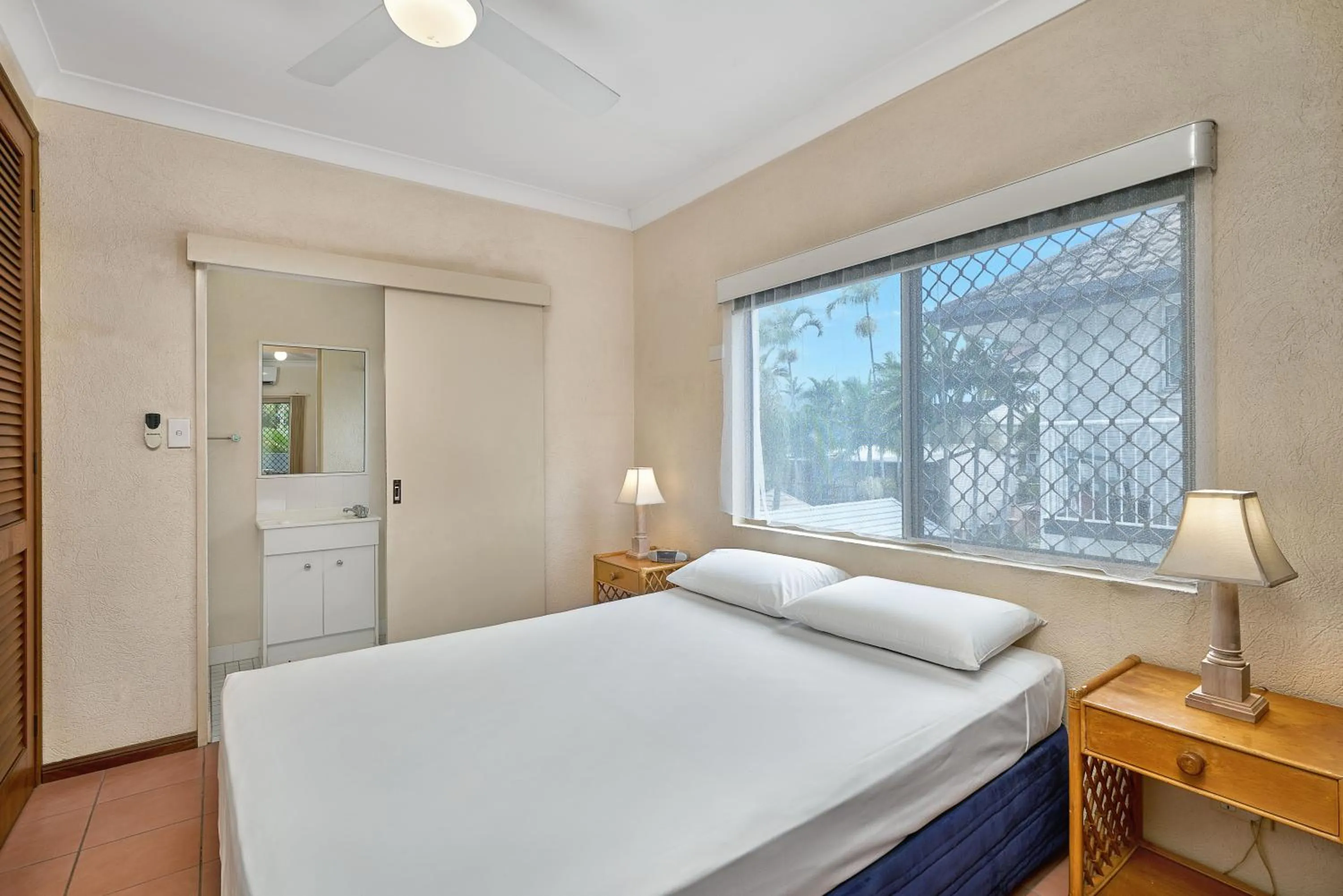 Bed in Royal Palm Villas