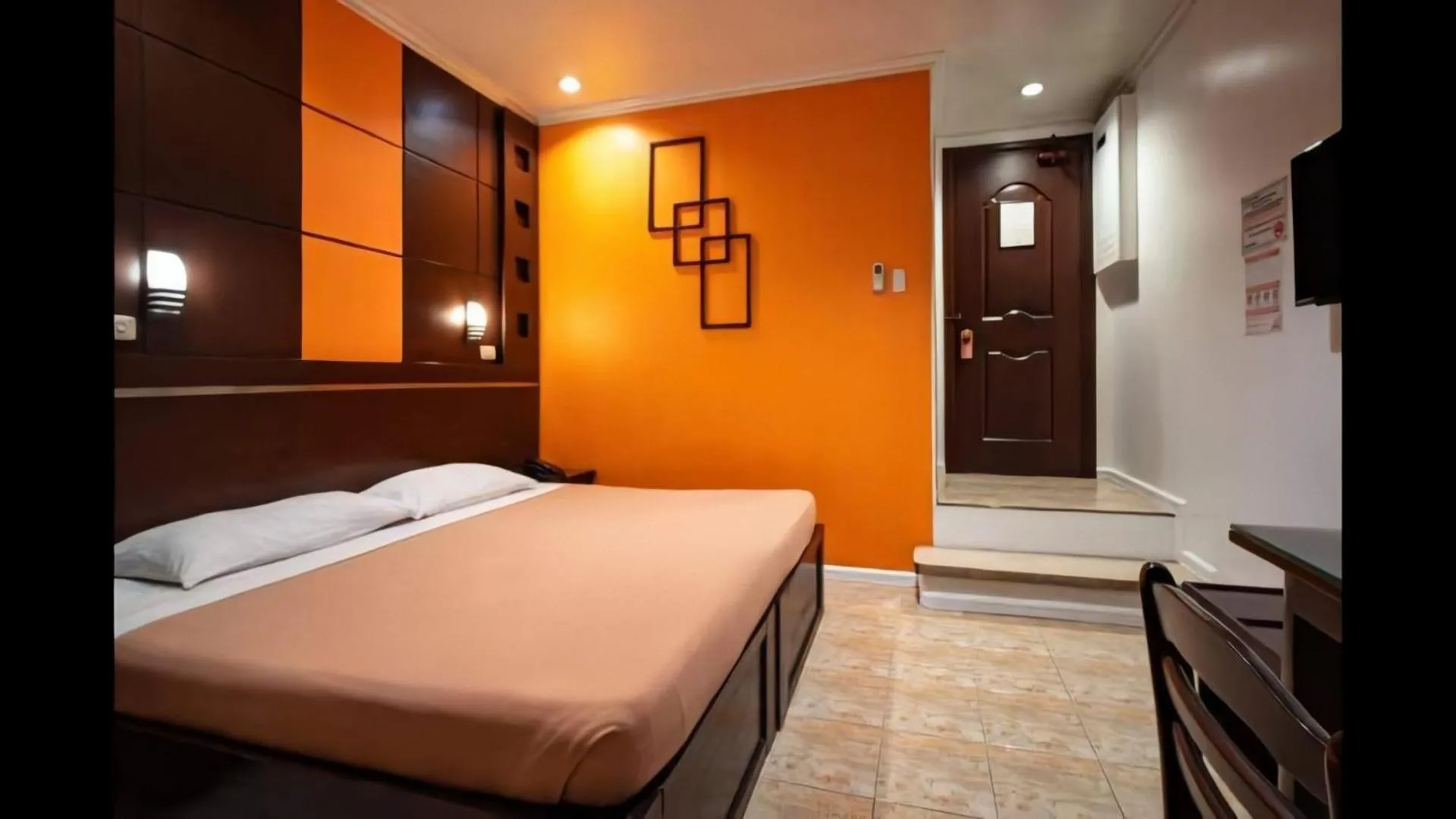 Bed in Paladin Hotel