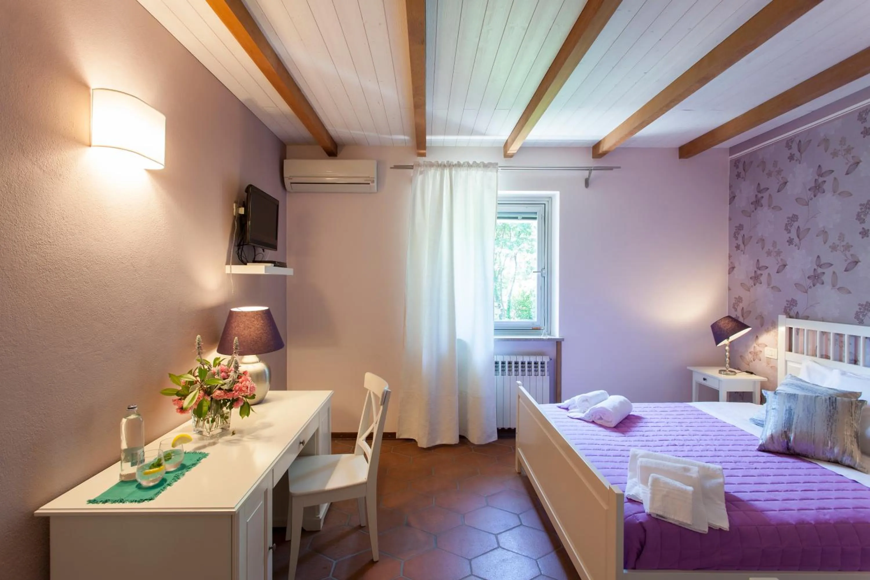 Photo of the whole room, Bed in Villa Borgo Duino