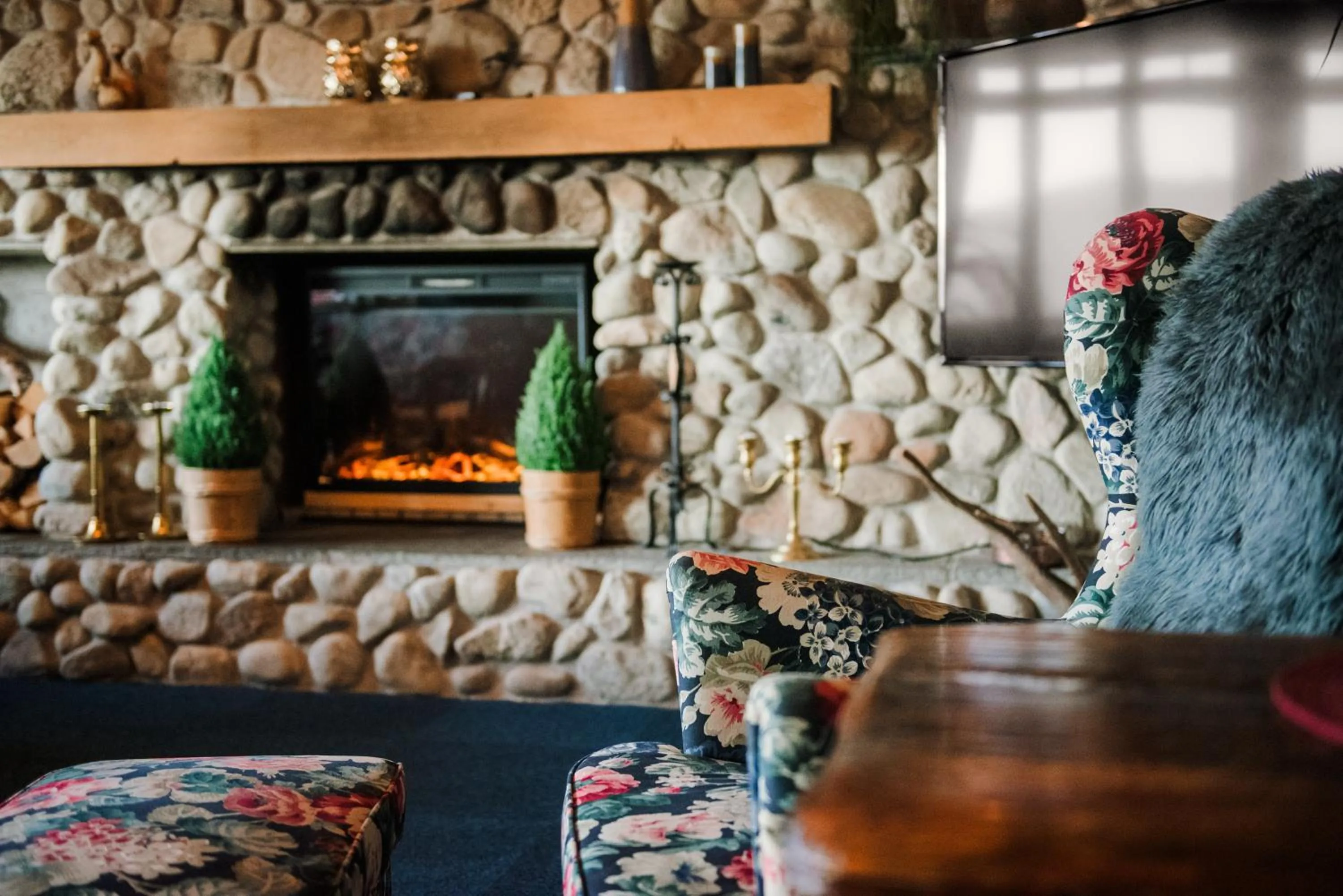 Communal lounge/ TV room in Vågslidtun Hotel