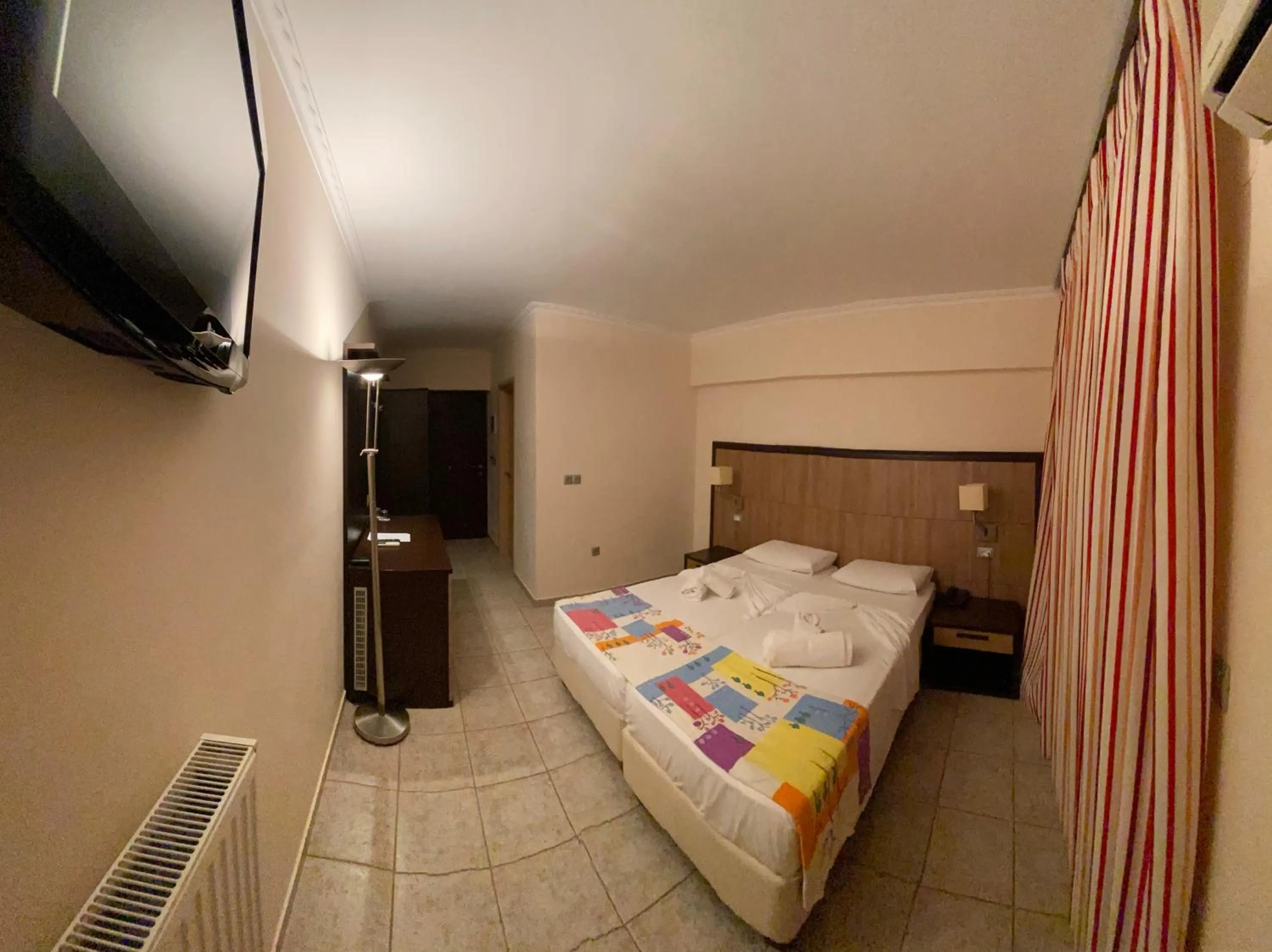 Bed in Kaiafas Lake Hotel