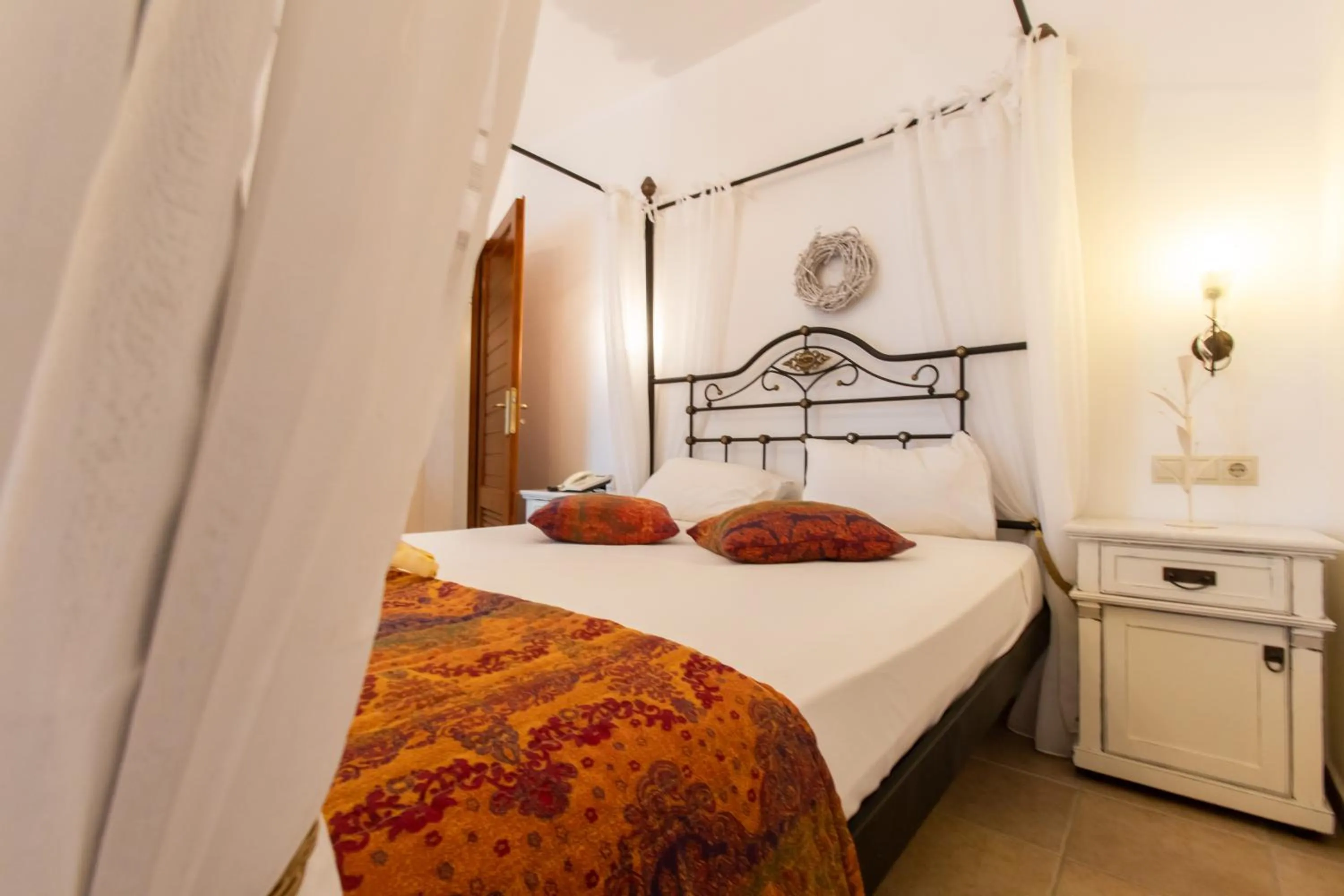 Bed in Plaza Beach Hotel