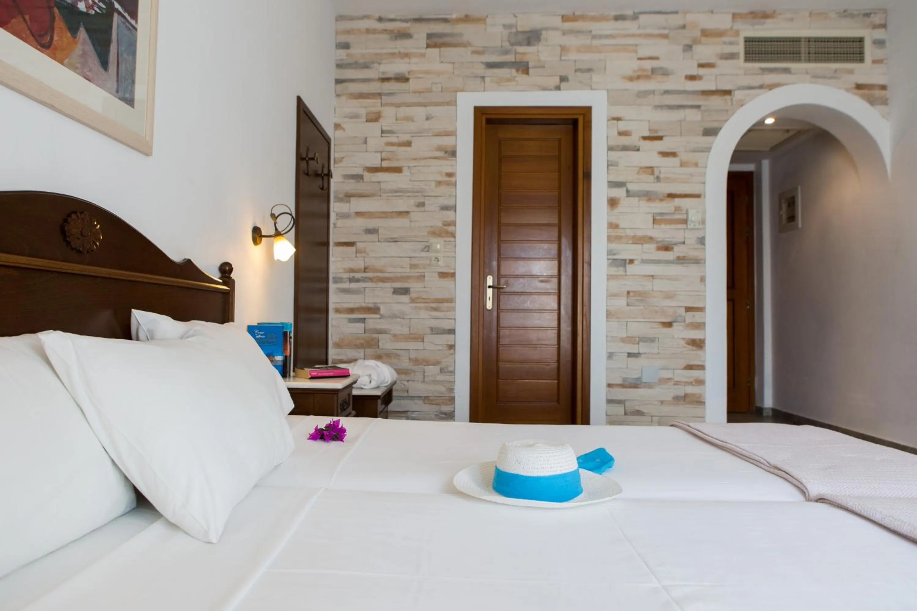 Bed in Plaza Beach Hotel