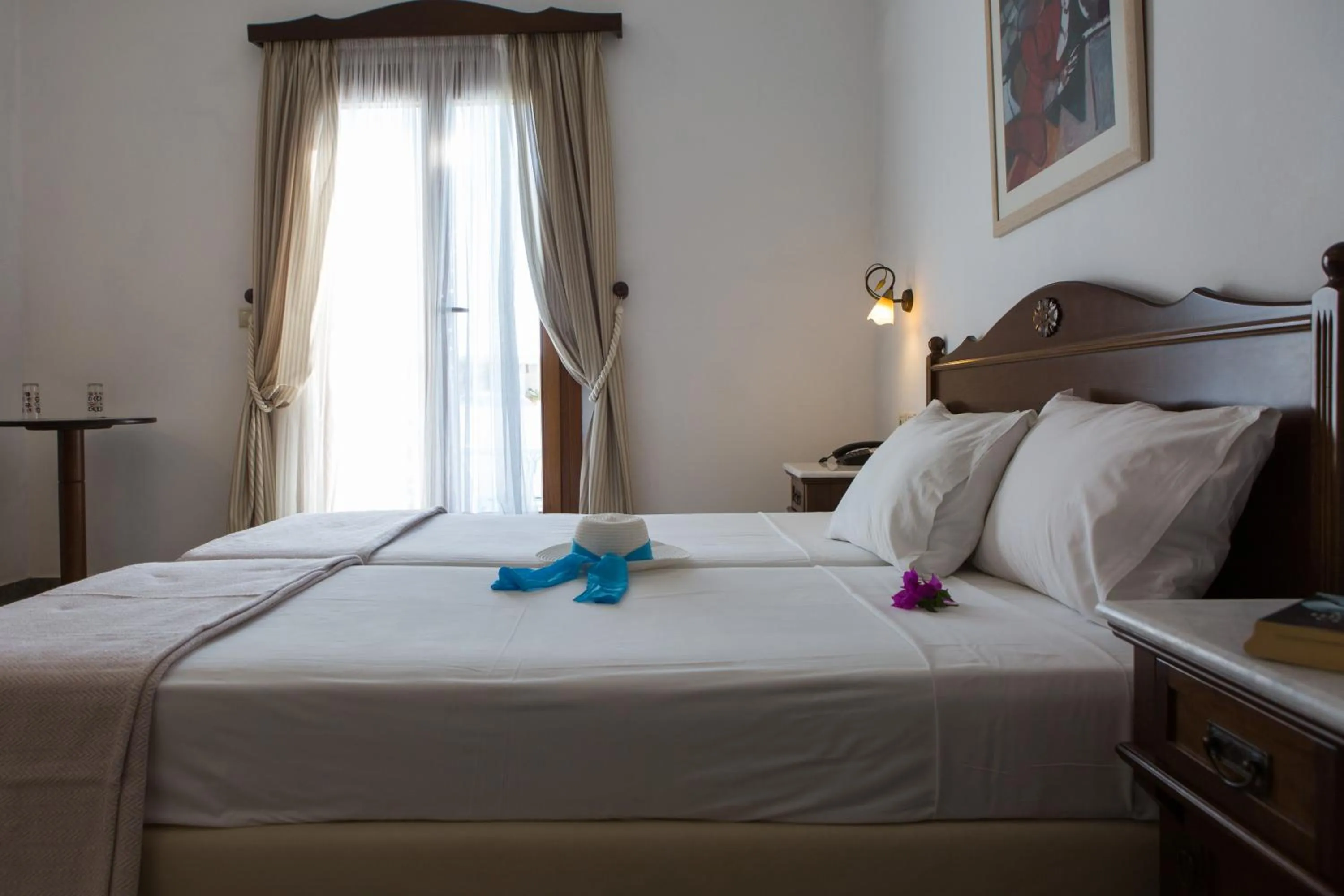 Bed in Plaza Beach Hotel