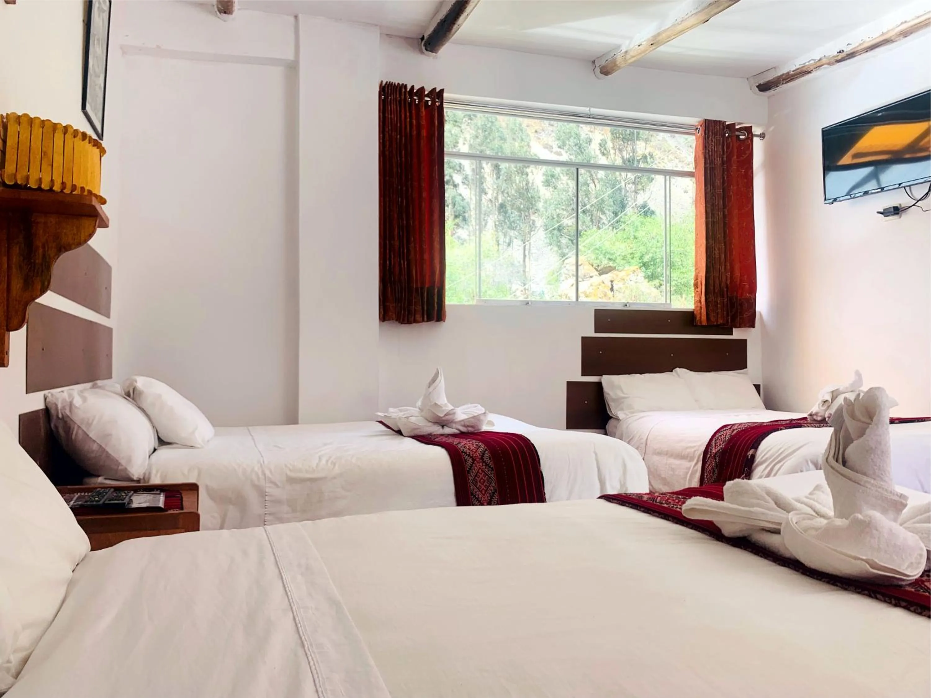 Bed in Inka Khawarina Tambo Lodge