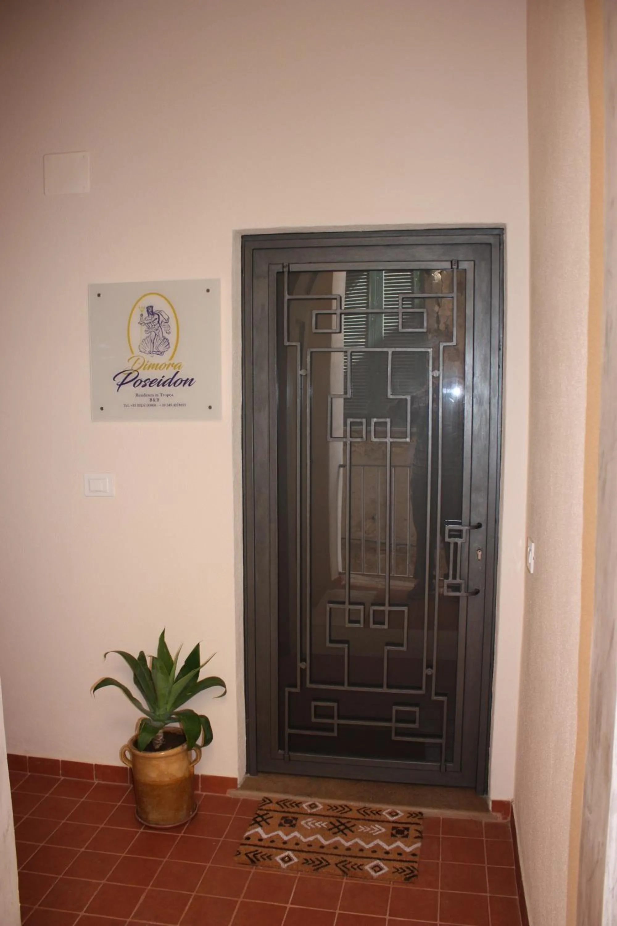 Property logo or sign in Dimora Poseidon