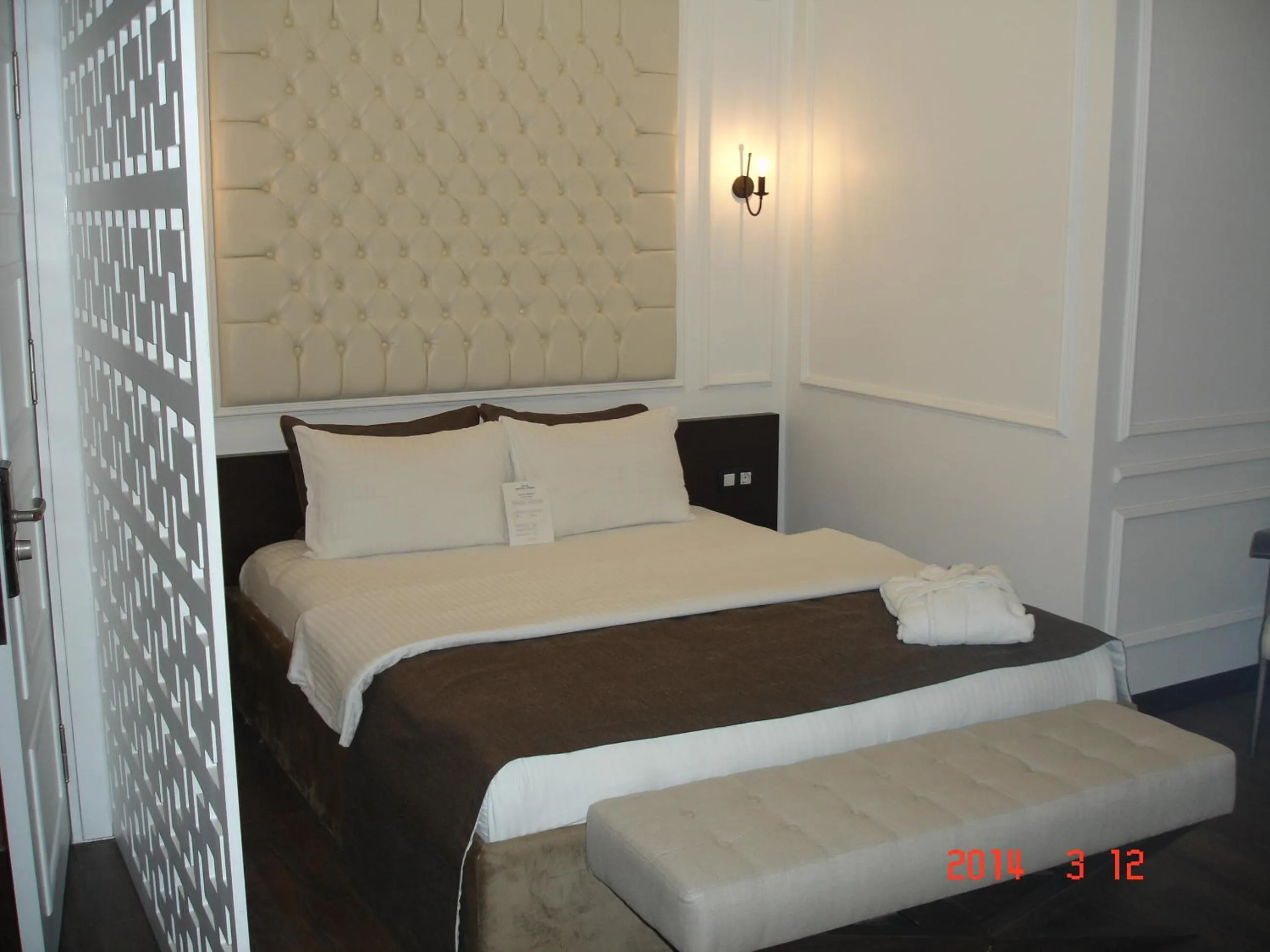 Seating area, Bed in North Point Hotel