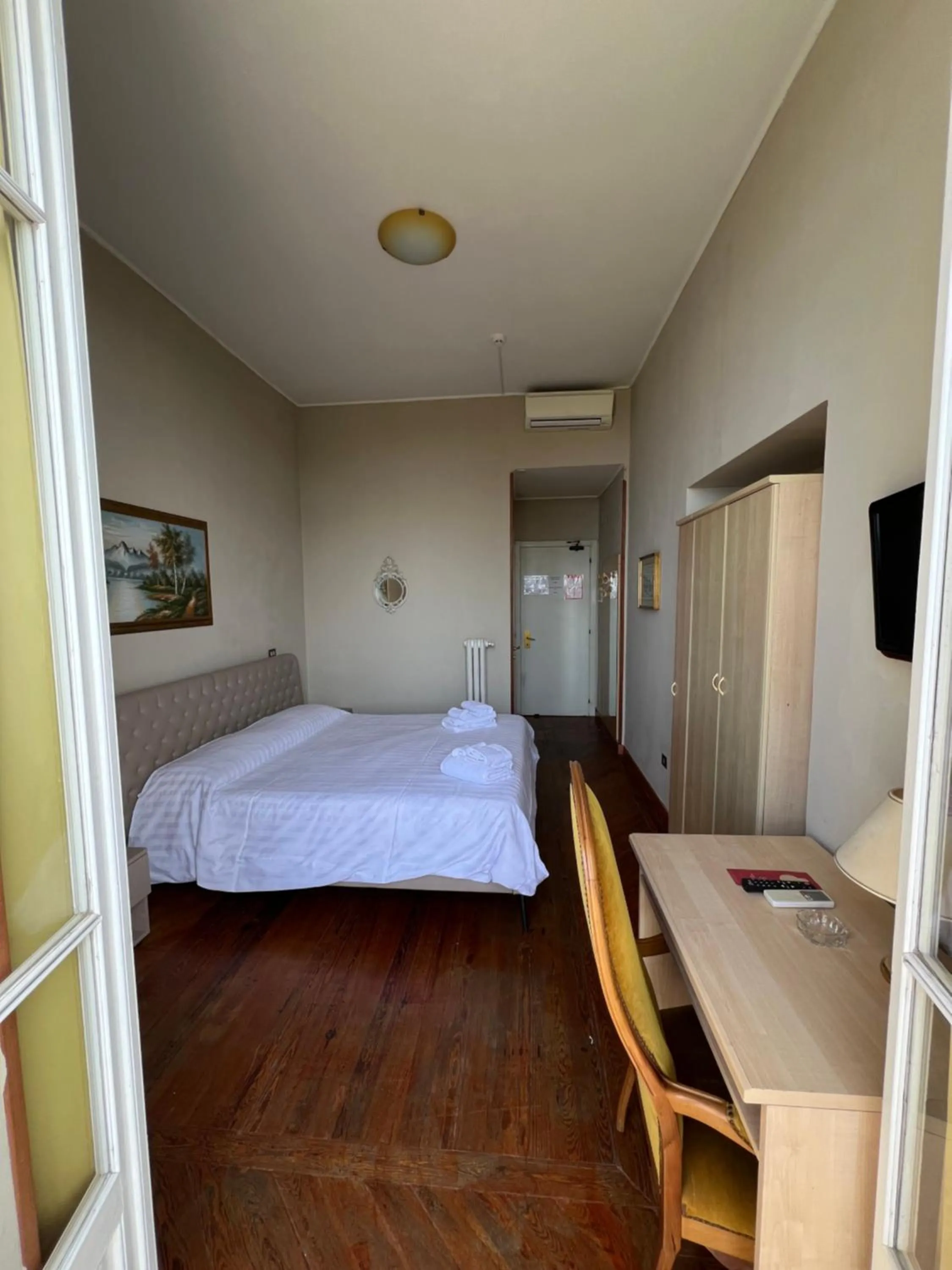 Bed in Hotel Petit Royal