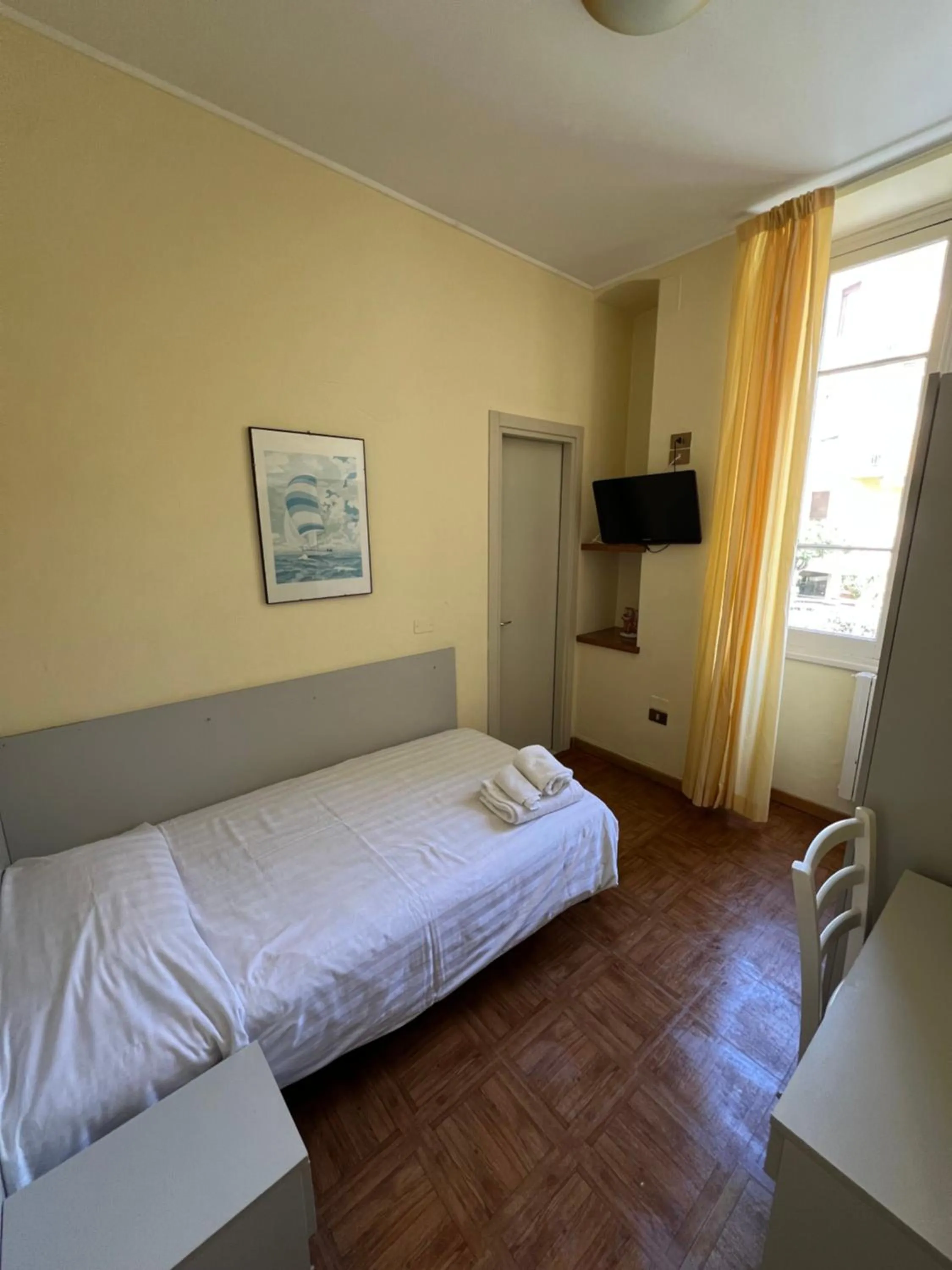 Bed in Hotel Petit Royal