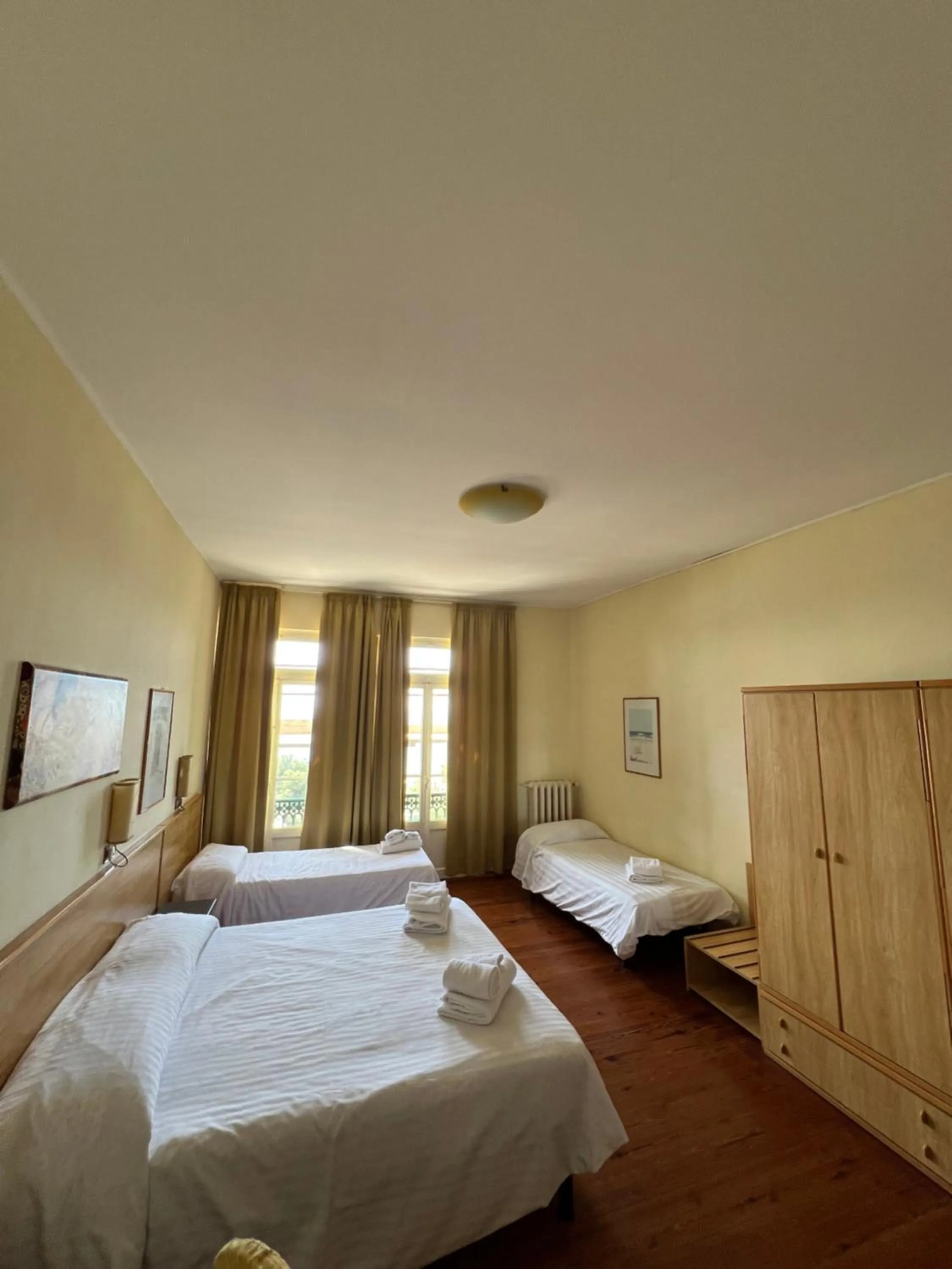 Bed in Hotel Petit Royal