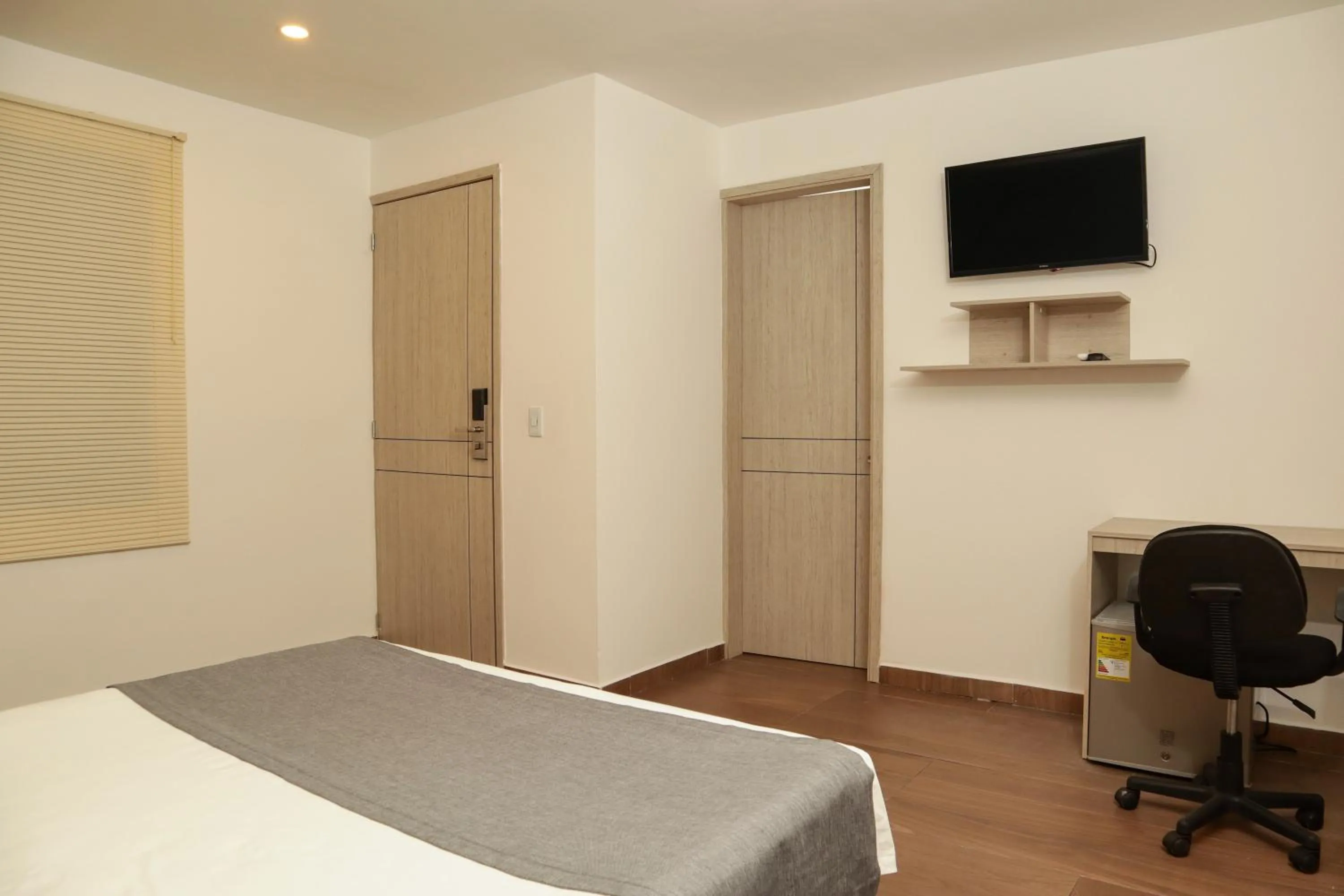 Bed in Basic Hotel Chipichape by Hoteles MS