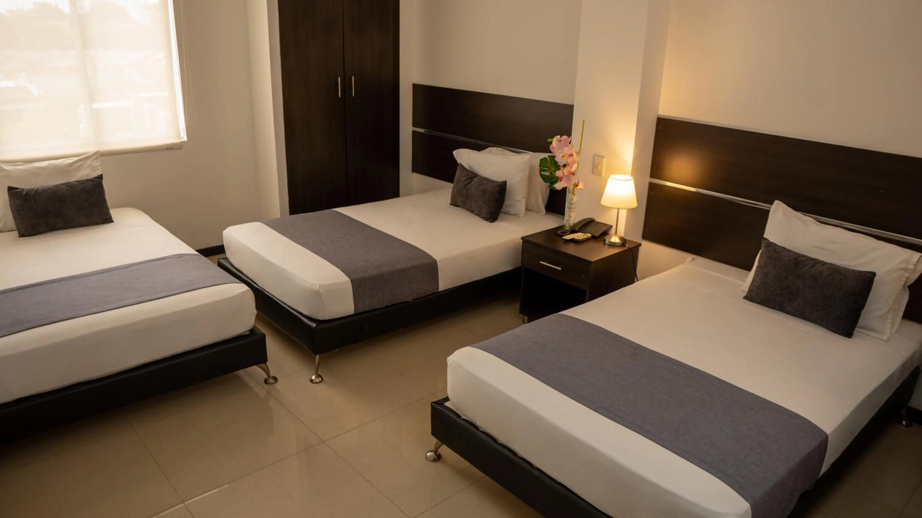 Bed in Basic Hotel Chipichape by Hoteles MS