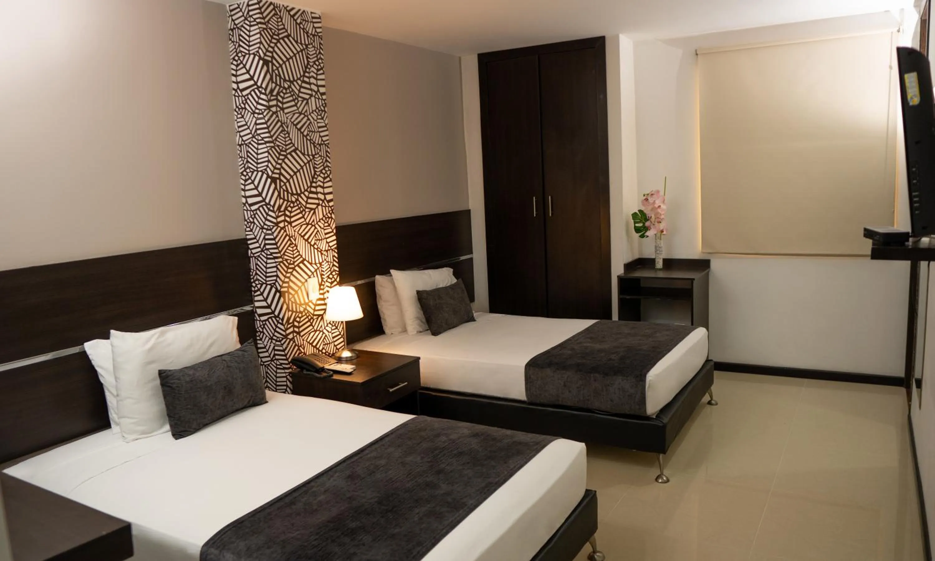 Bed in Basic Hotel Chipichape by Hoteles MS