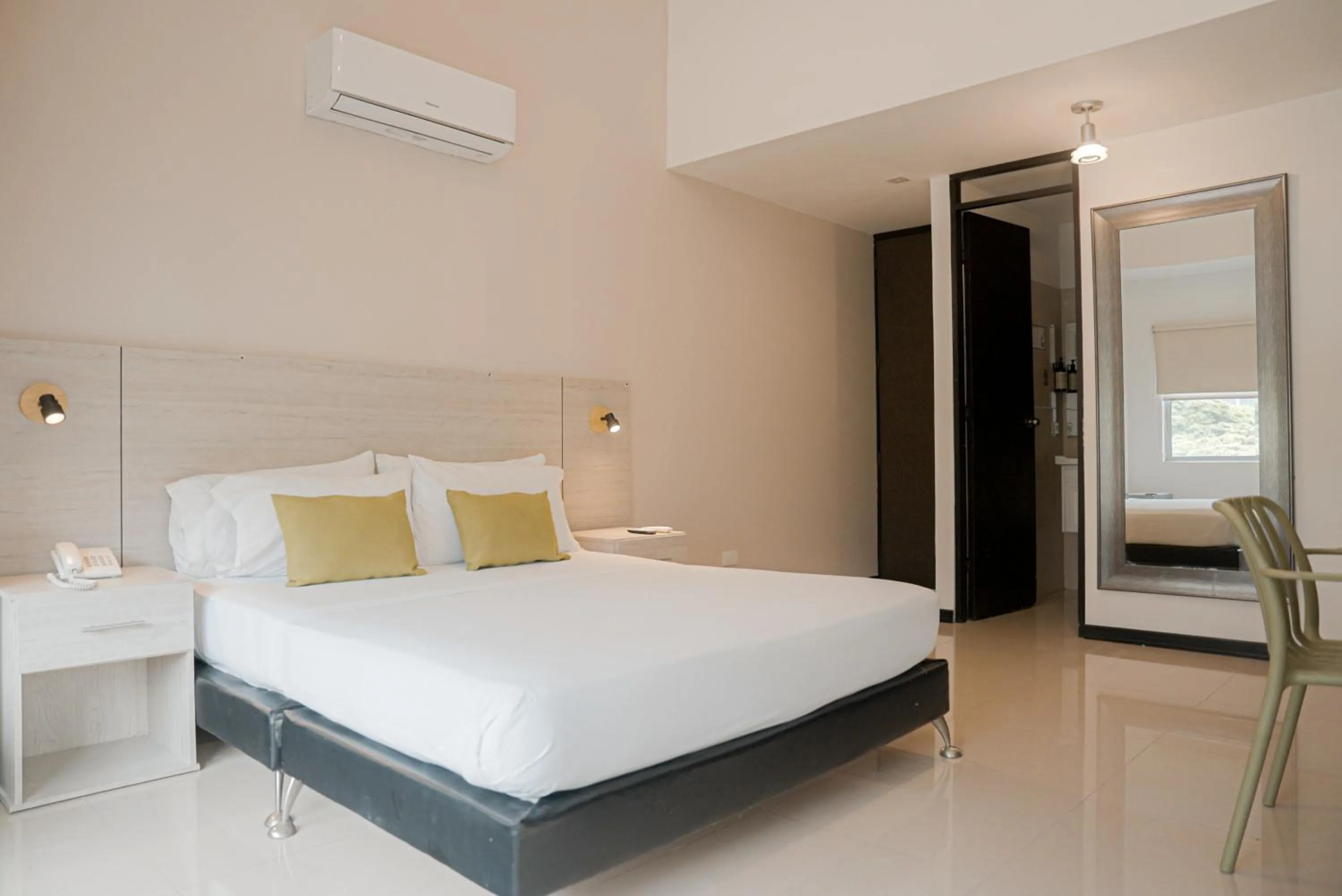 Bed in Basic Hotel Chipichape by Hoteles MS