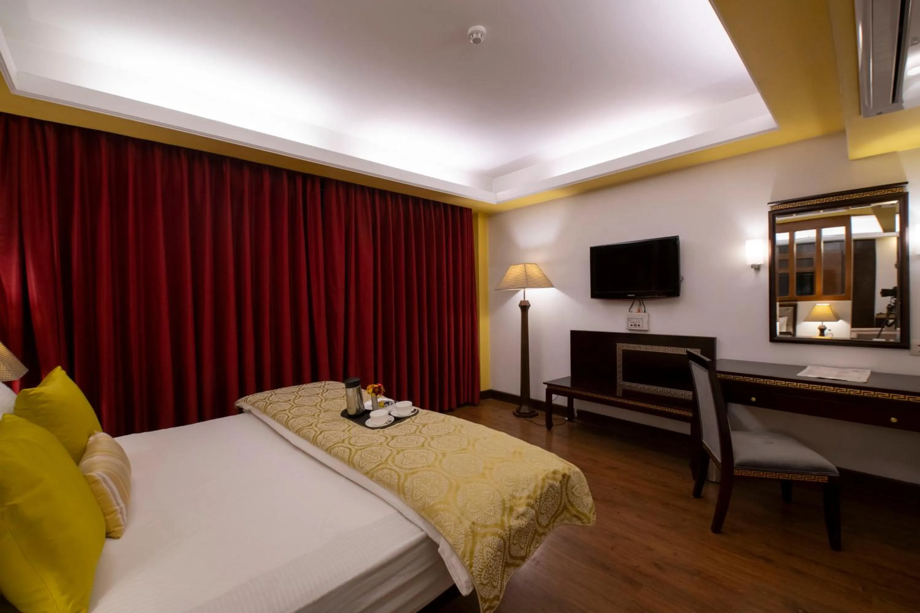 Bed in Mastiff Grand Manali Resort