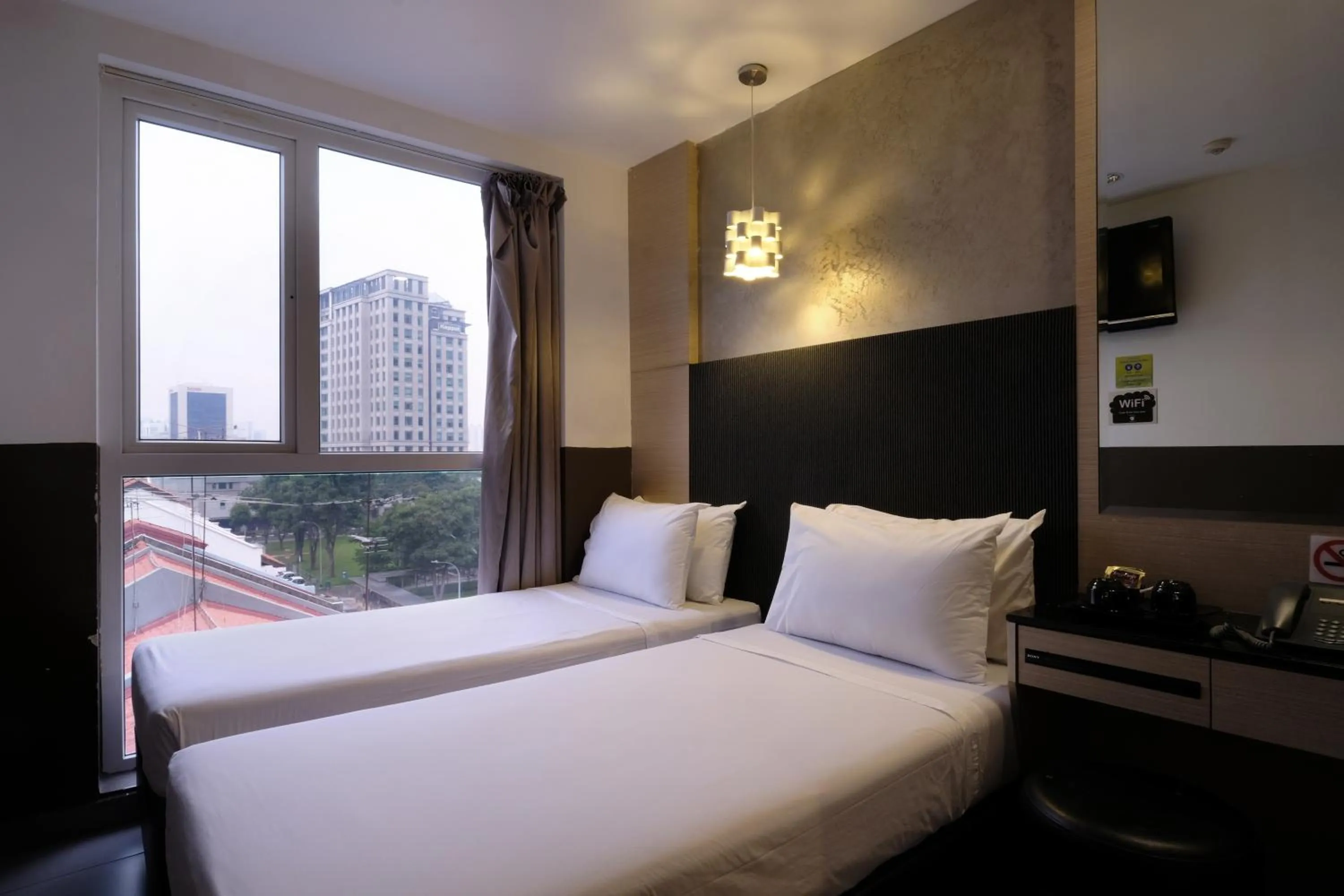 Photo of the whole room, Bed in The Snooze Hotel at Bugis