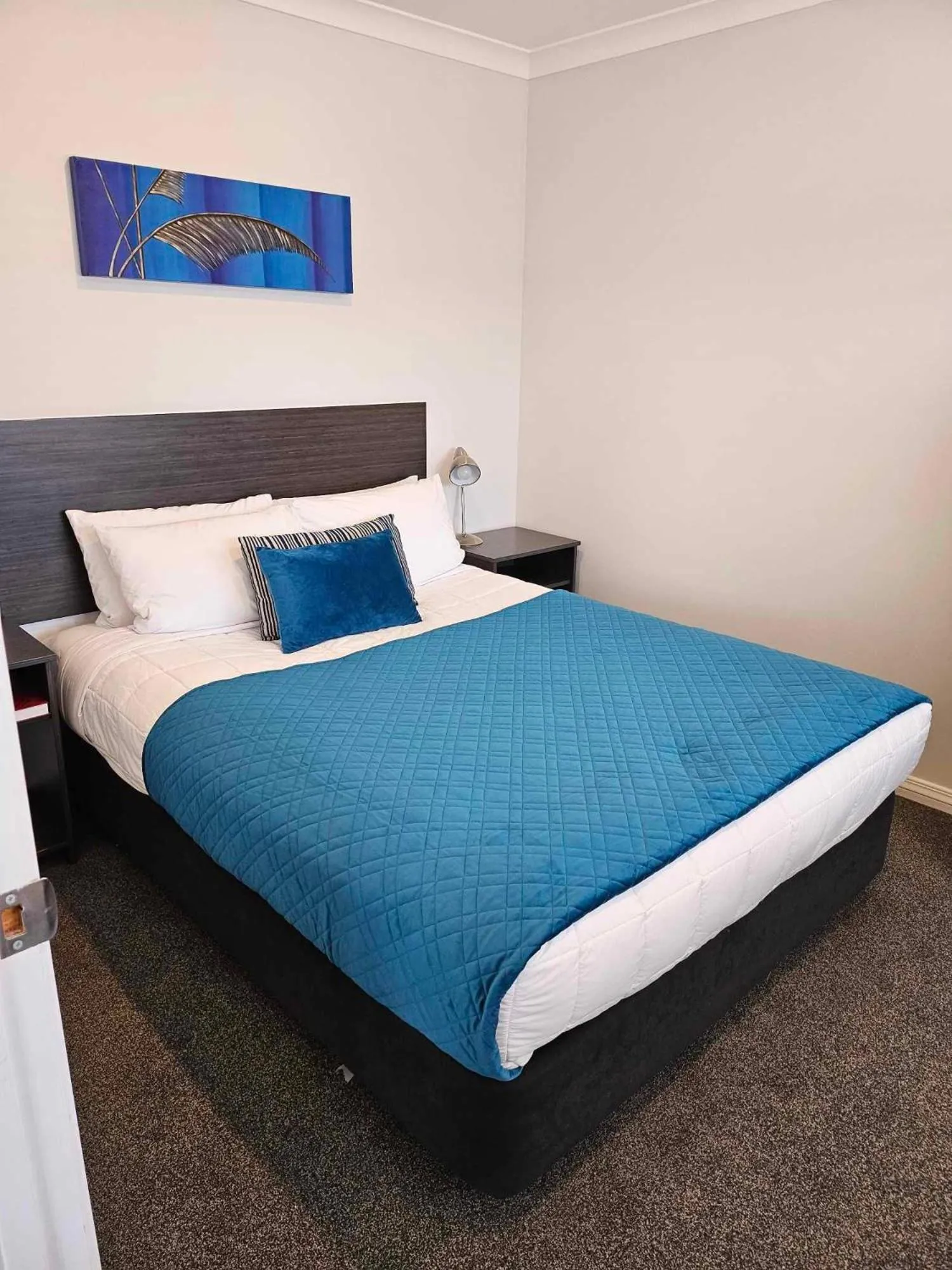 Bed in Beach Street Motel Apartments