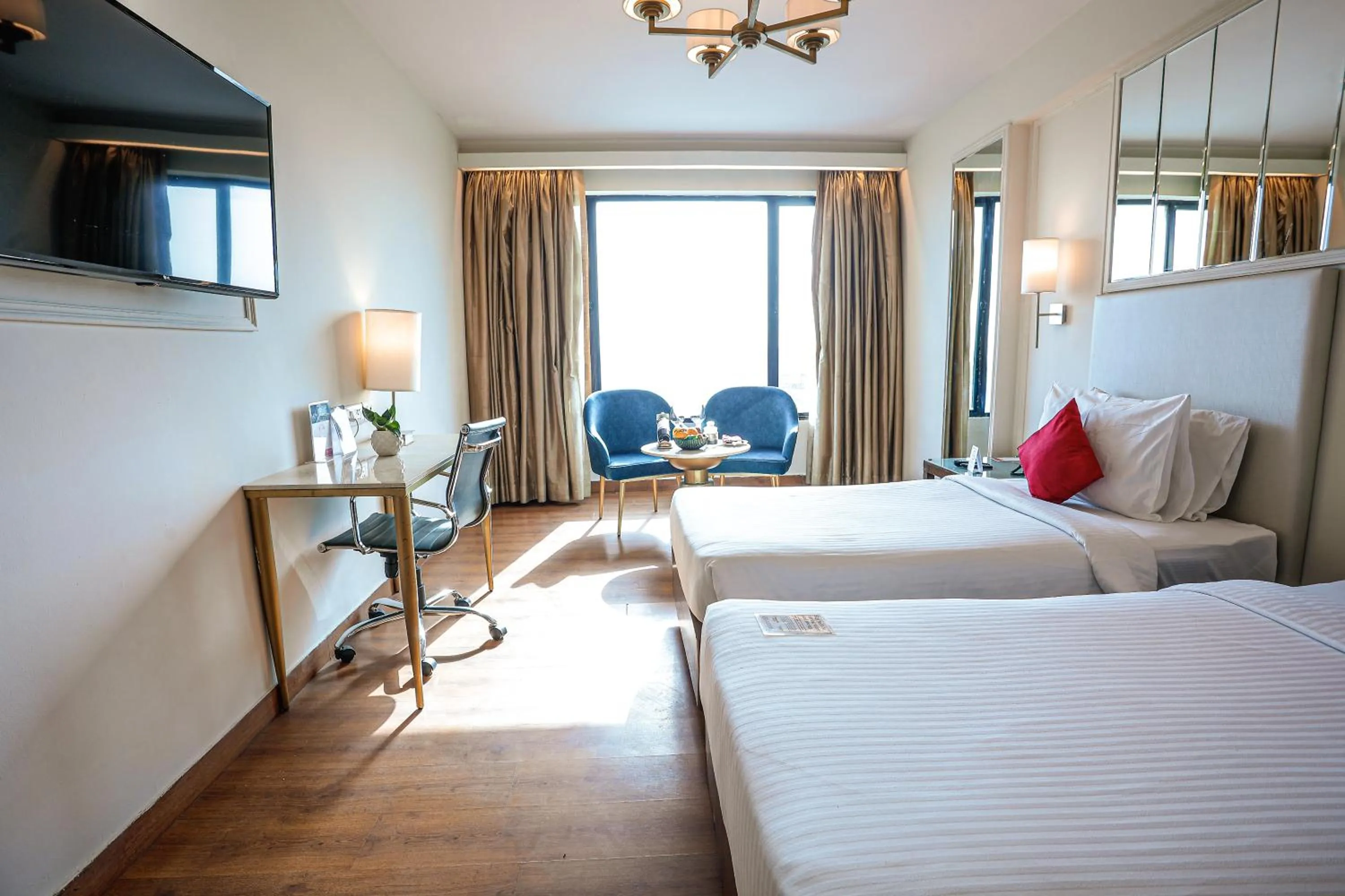 Bed in Ramada by Wyndham Jaipur North