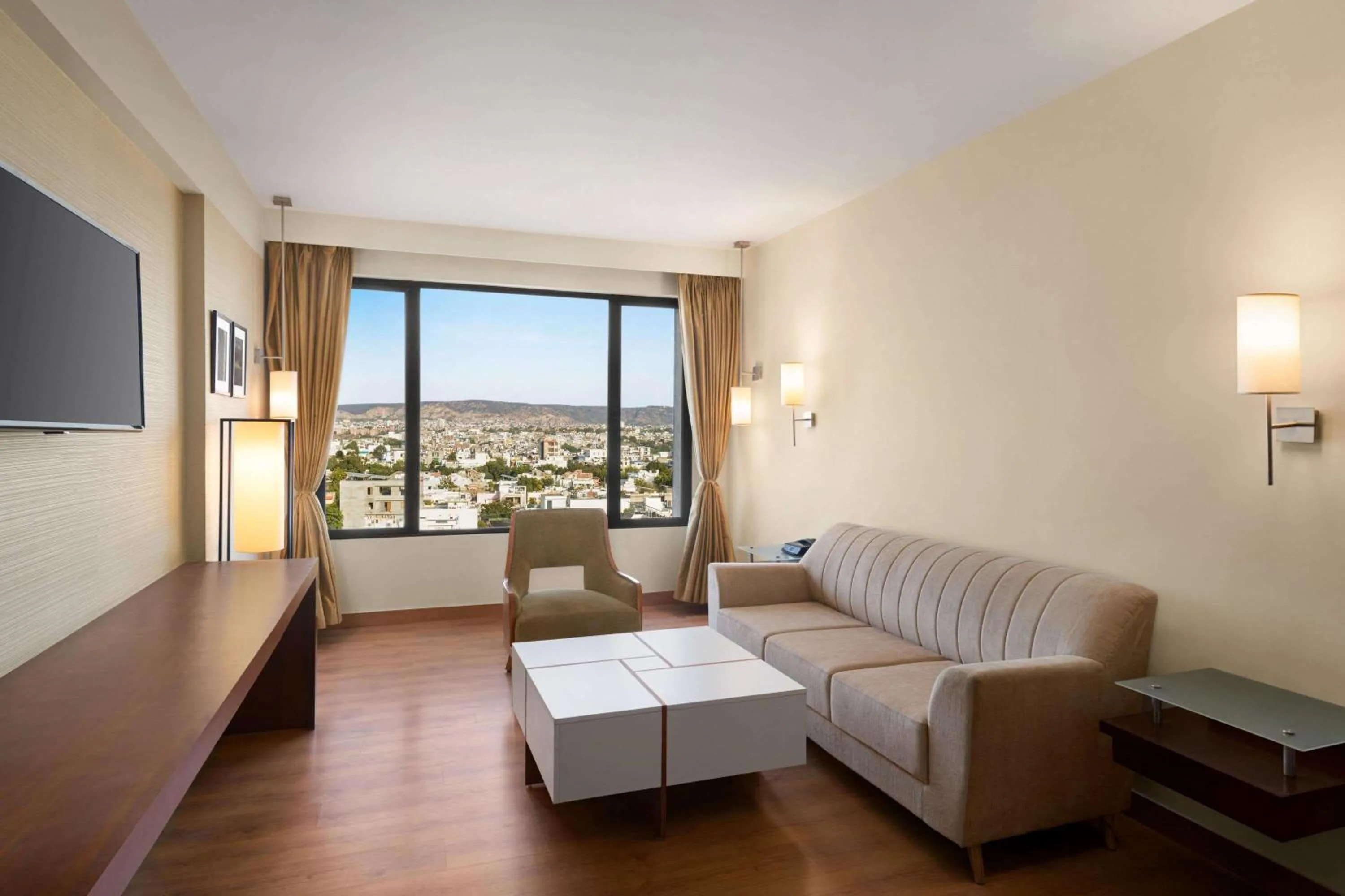 Living room in Ramada by Wyndham Jaipur North