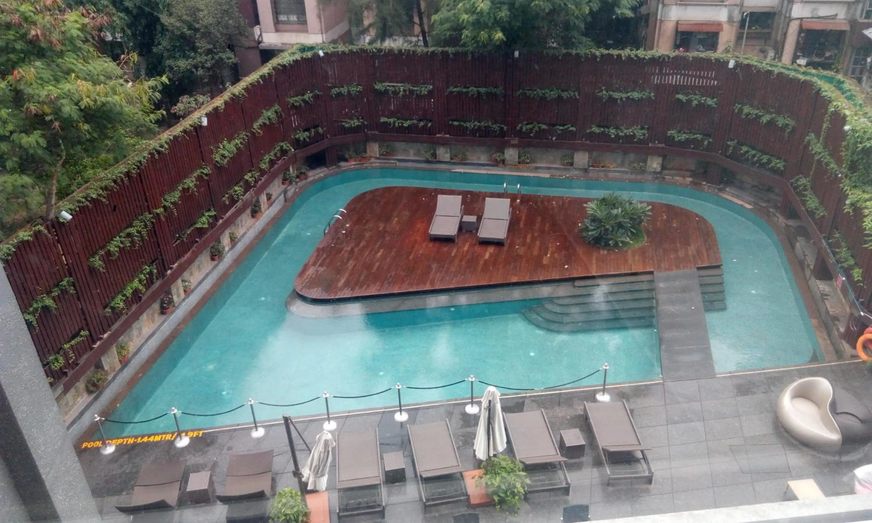 Swimming pool in Crowne Plaza Pune City Centre by IHG