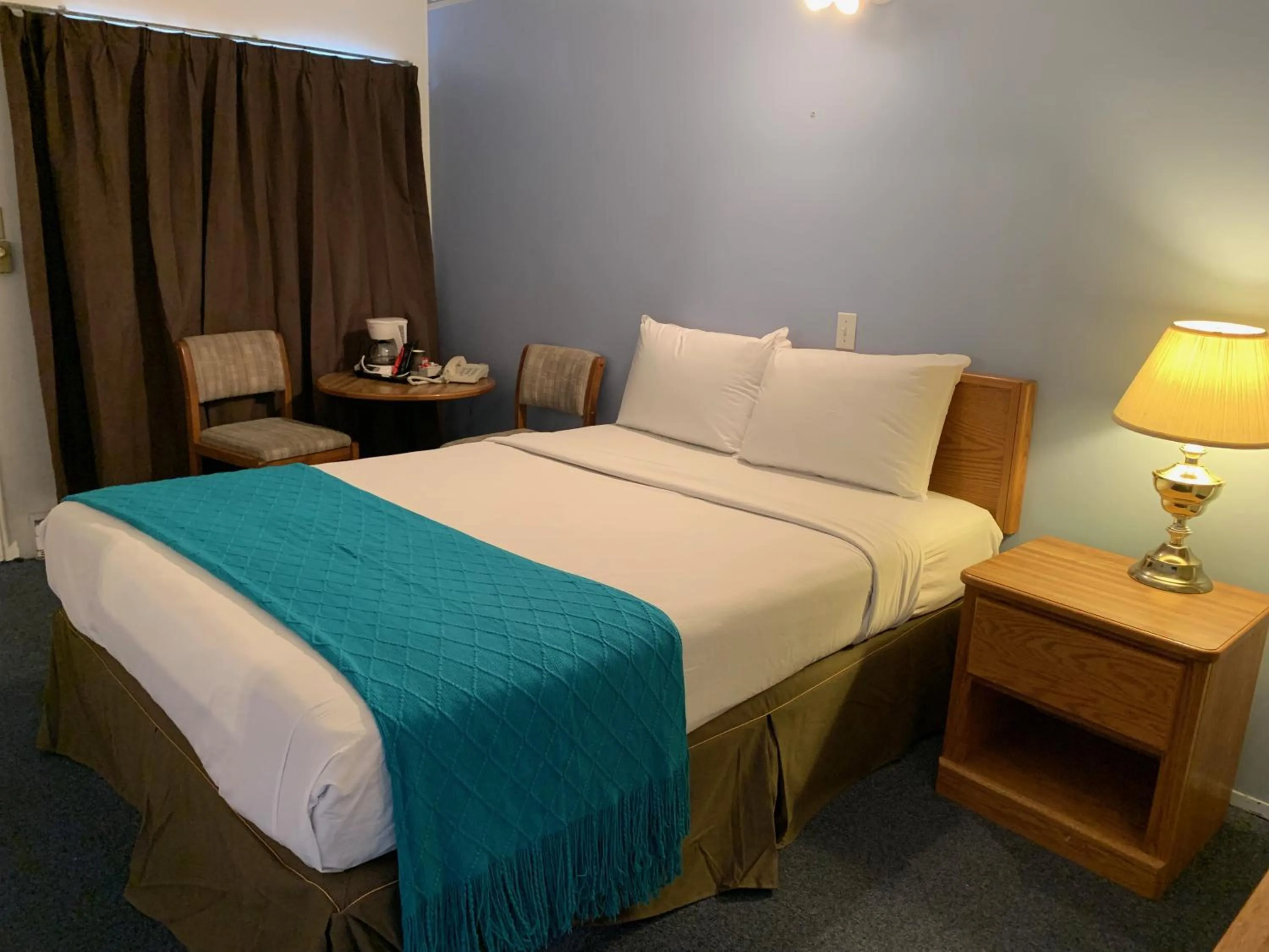 Bed in Swiss Sunset Inn