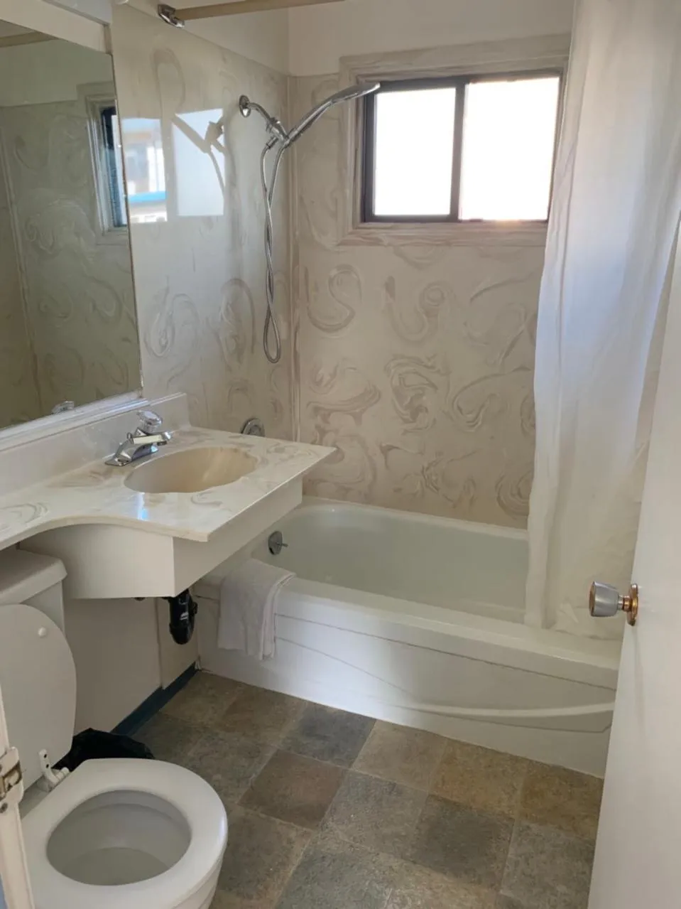 Bathroom in Swiss Sunset Inn