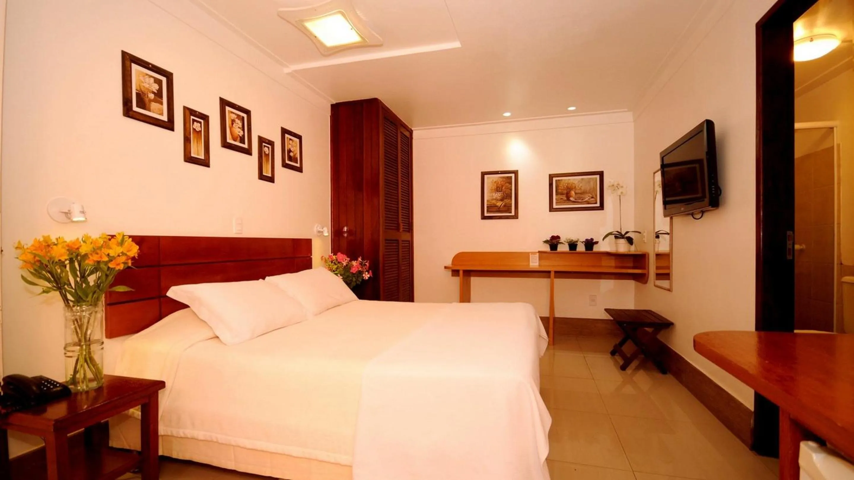 Bed in Pousada El Parador