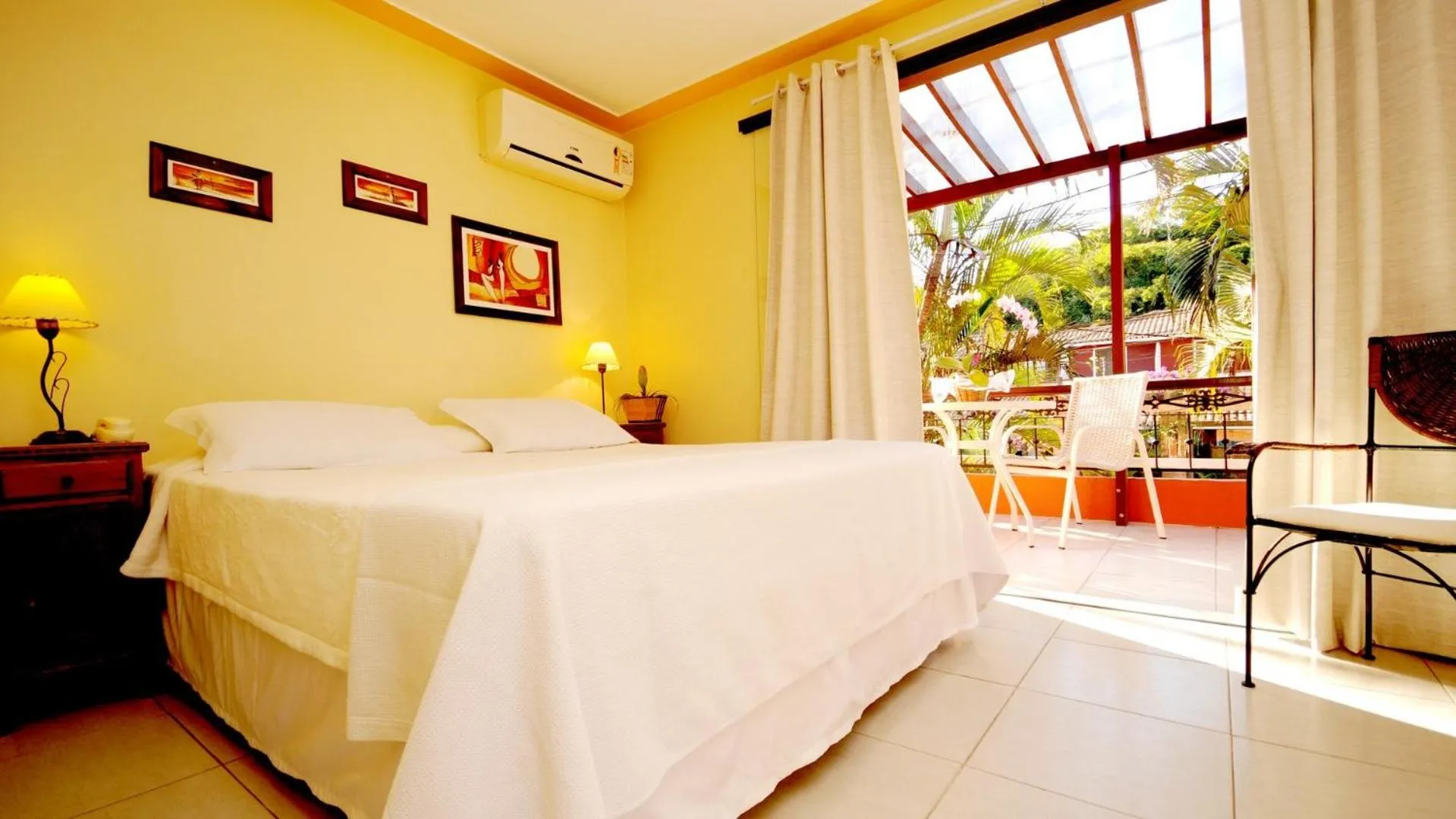 Bed in Pousada El Parador