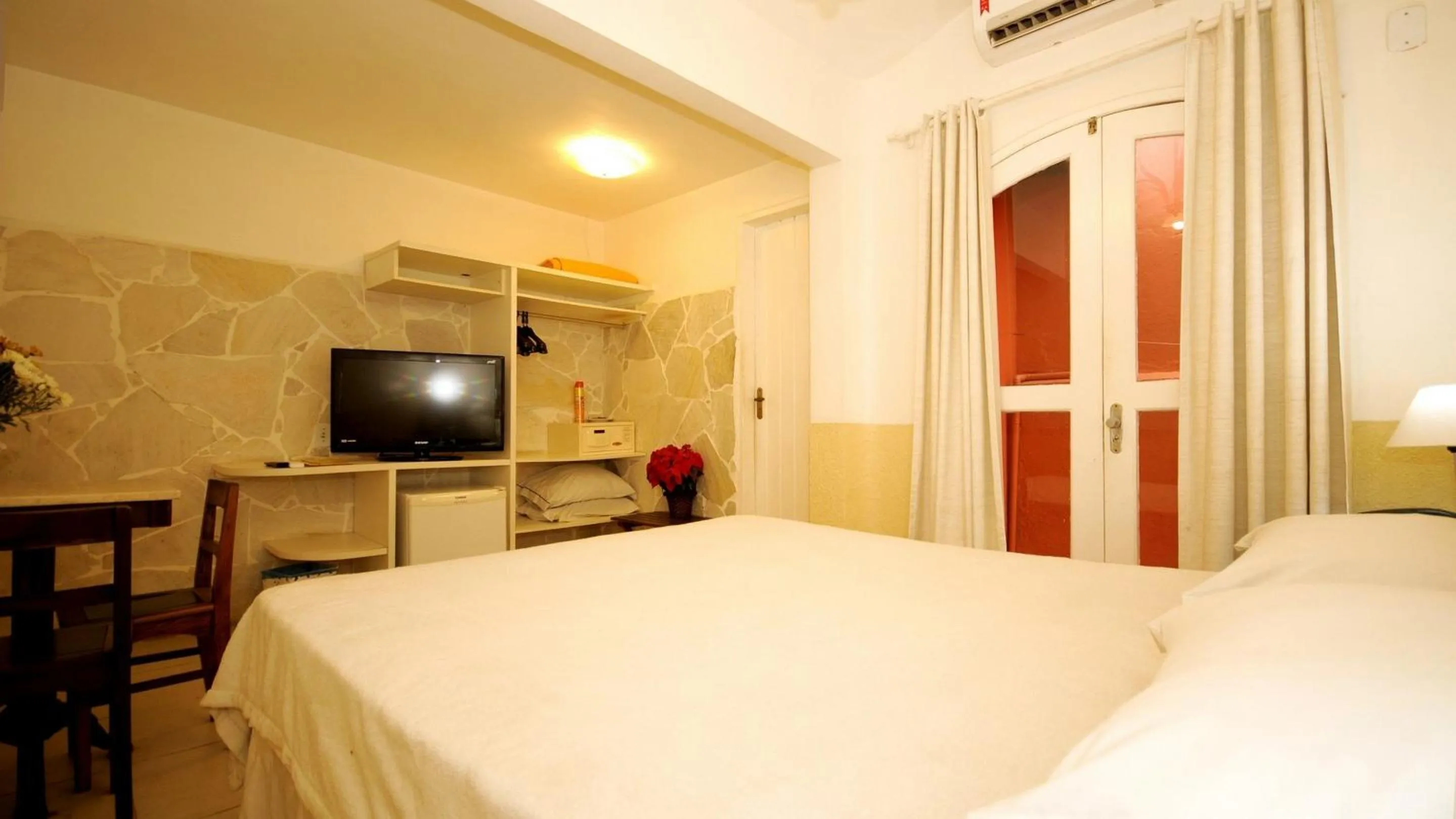 Patio, Bed in Pousada El Parador