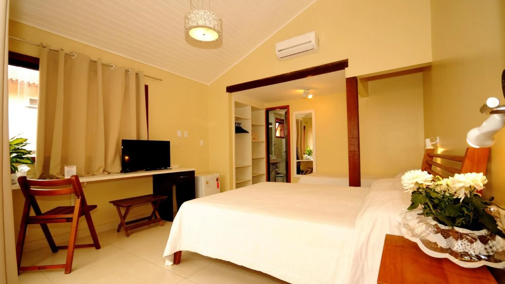 Bed in Pousada El Parador