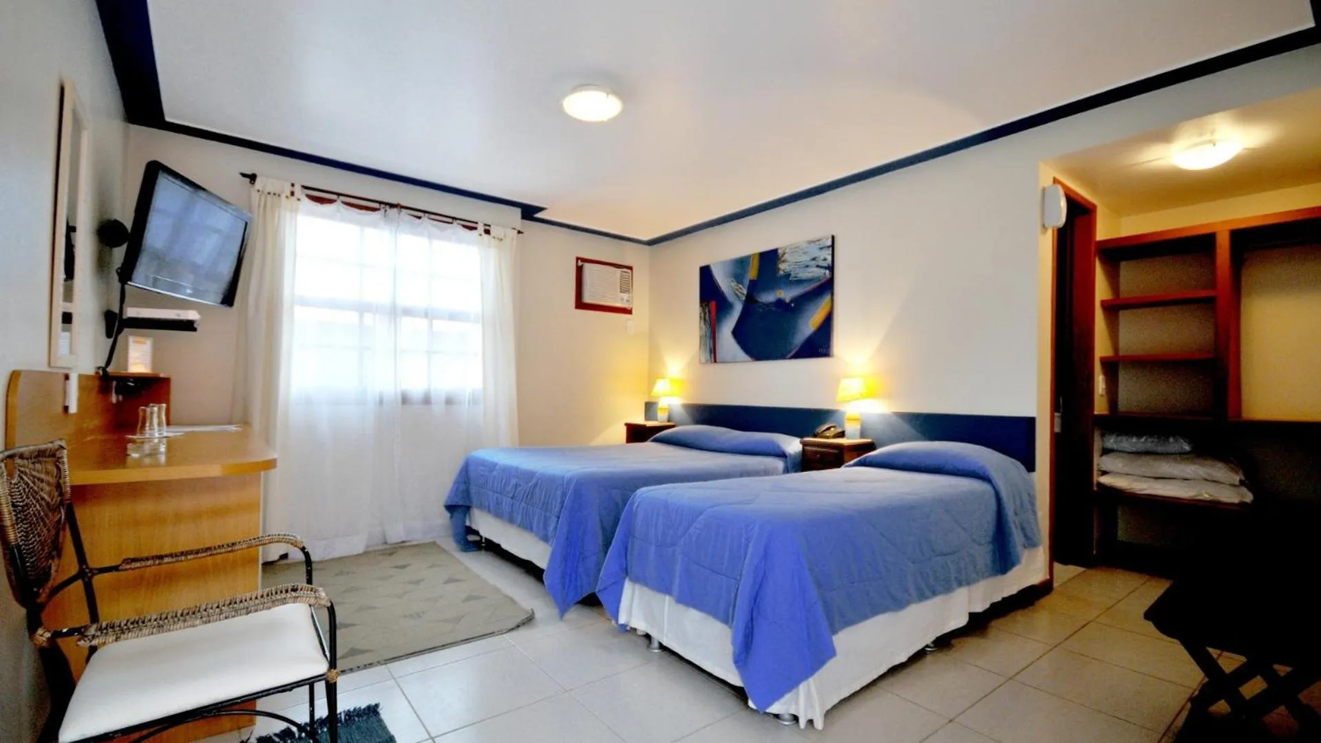 Bed in Pousada El Parador