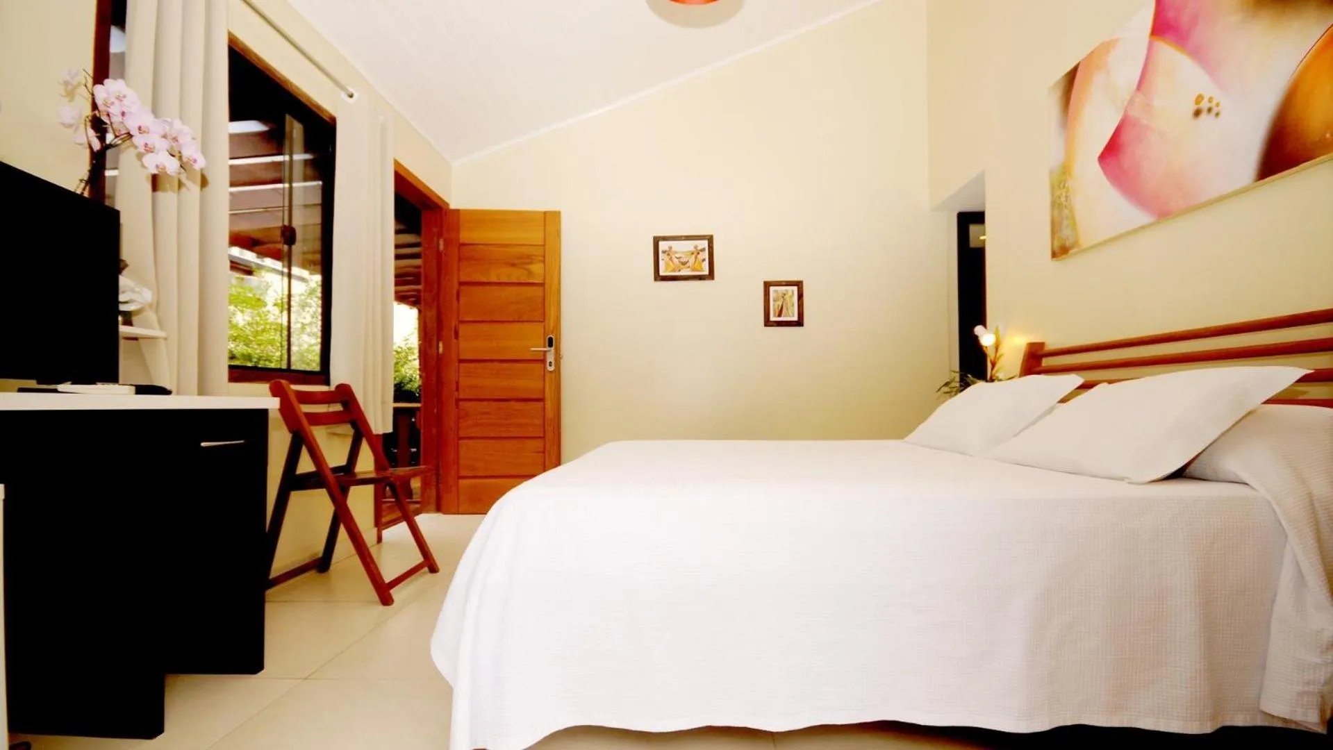 Bed in Pousada El Parador