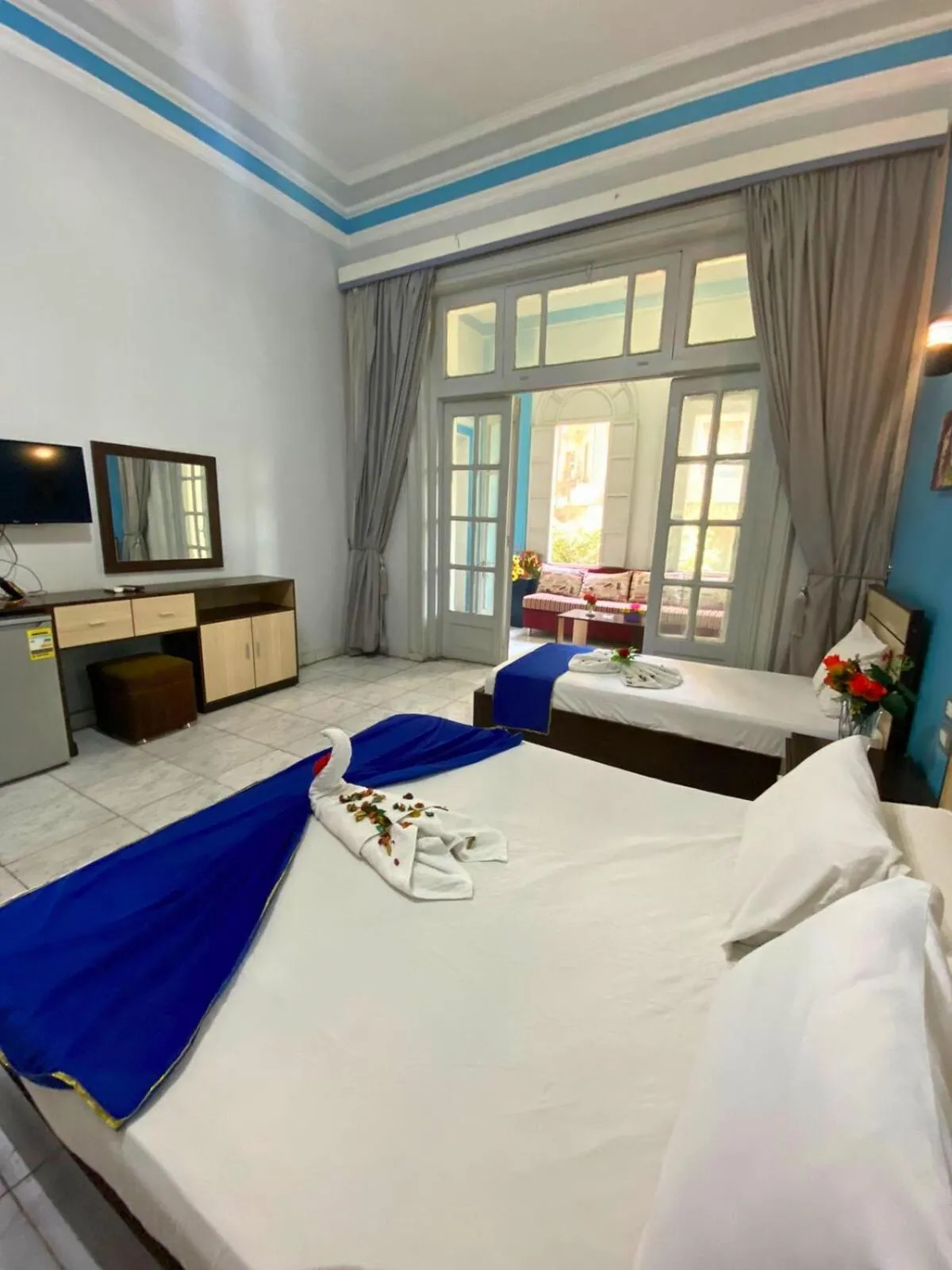 Communal lounge/ TV room, Bed in Hostgram Hotel