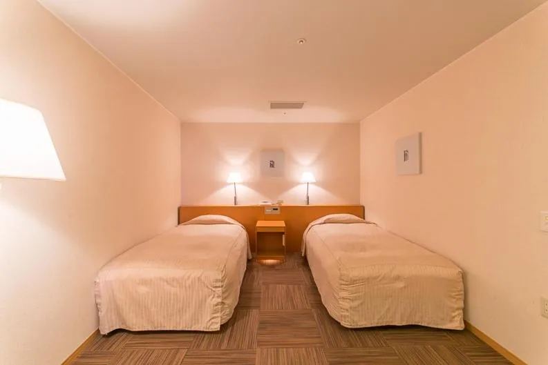 Bed in Hotel Landmark Wakayama