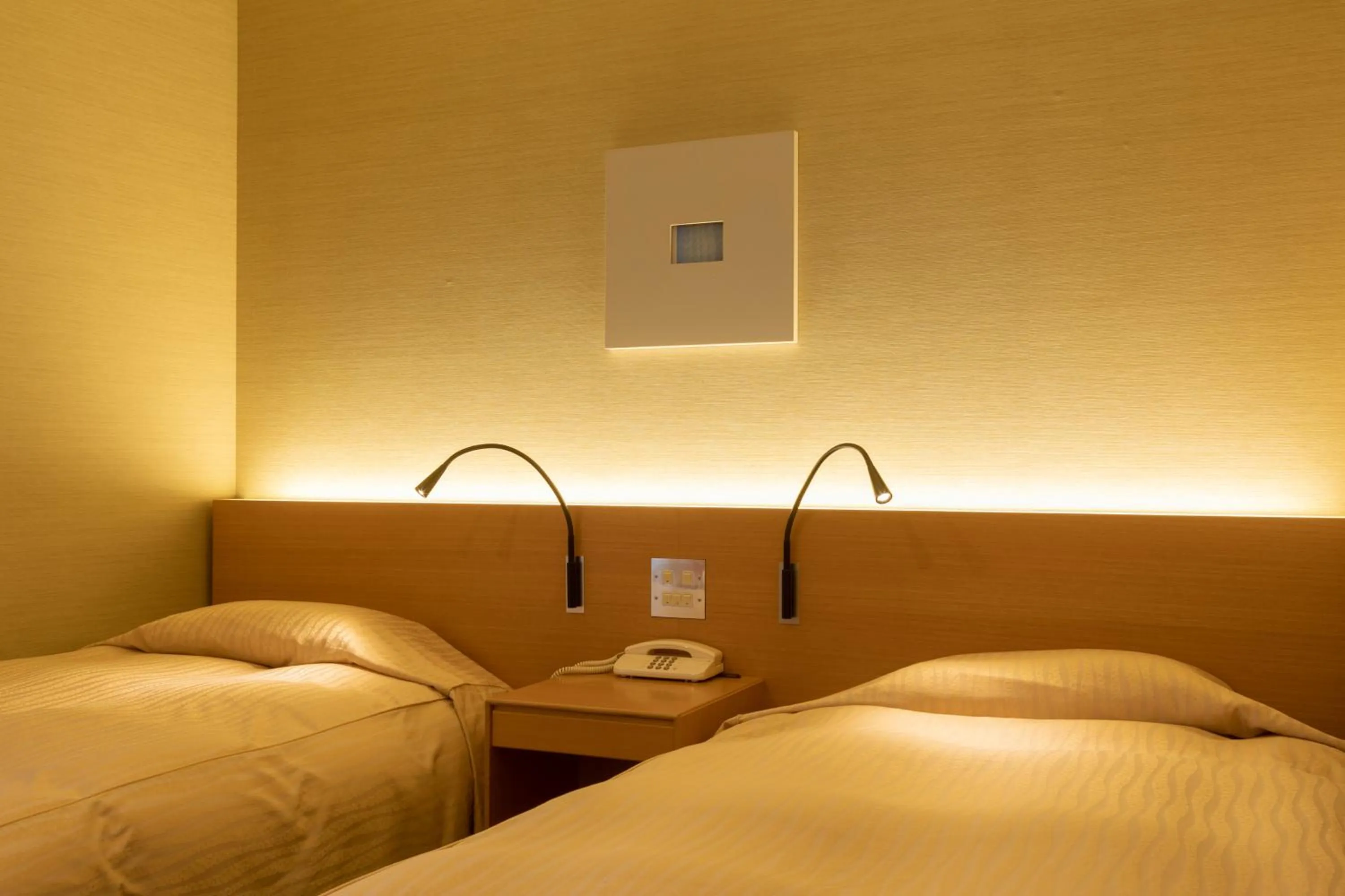 Bed in Hotel Landmark Wakayama