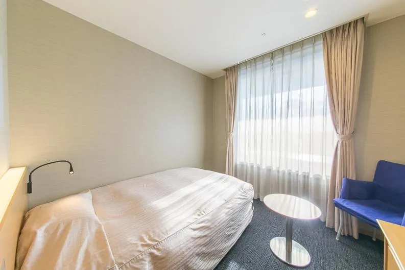 Bed in Hotel Landmark Wakayama