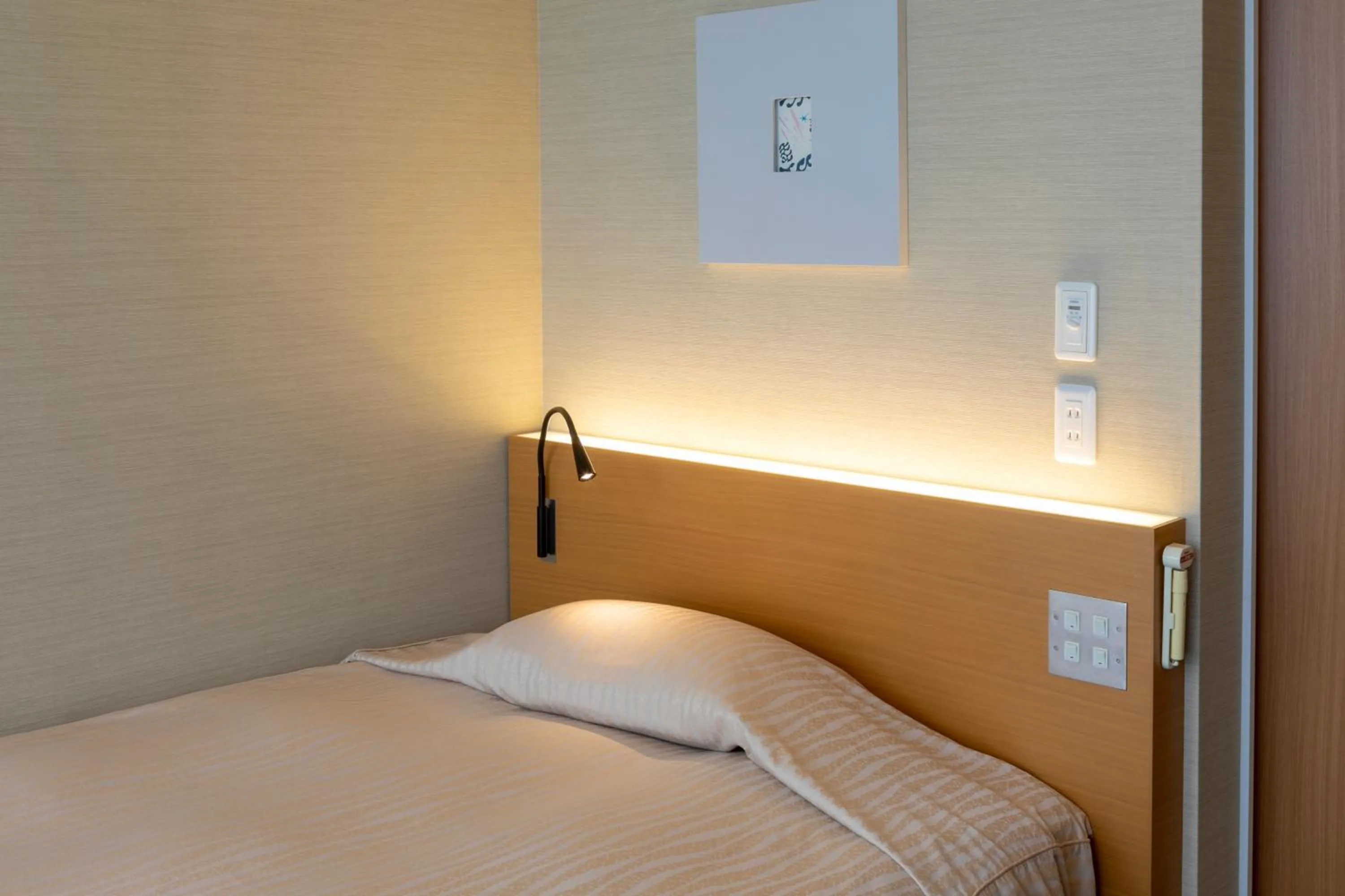 Bed in Hotel Landmark Wakayama