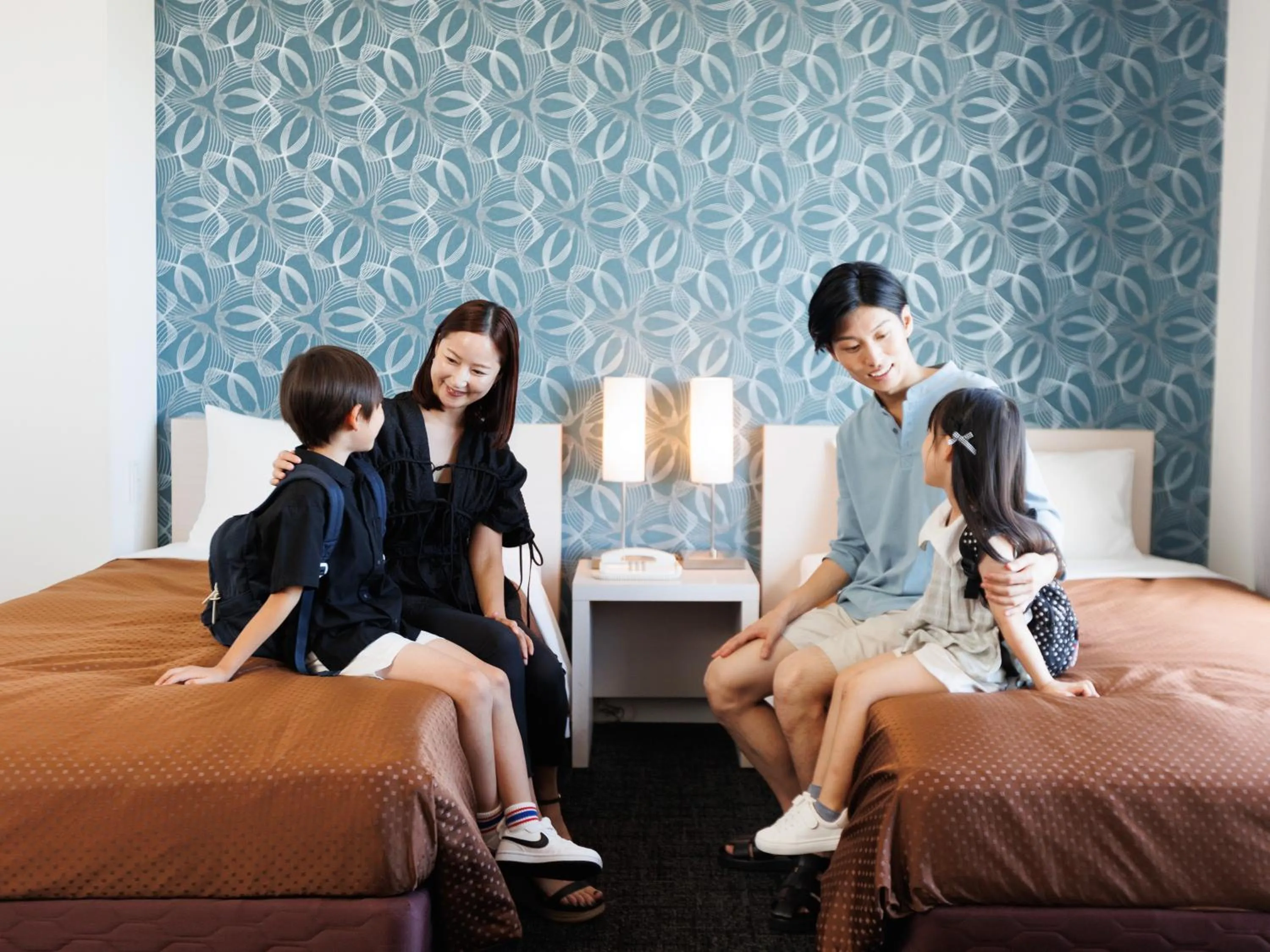 Bed in J Hotel Rinku